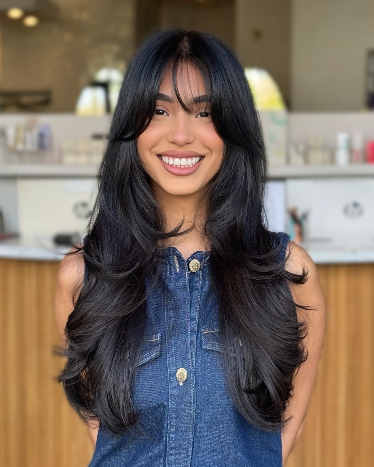 Deep-Feathered Long Layers with Blown-Out Curtain Bangs