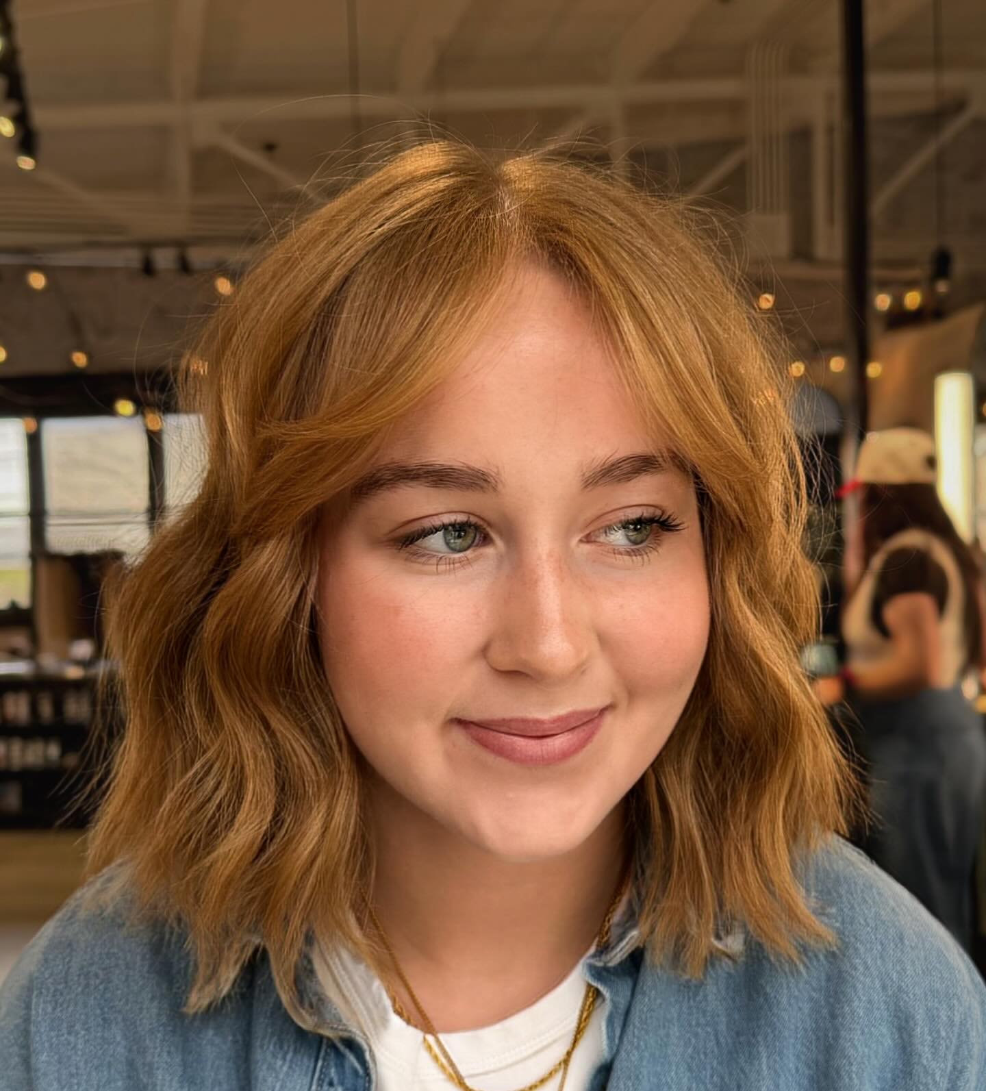 Jaw-Grazing Lob with Soft Center-Part Curtain Bangs