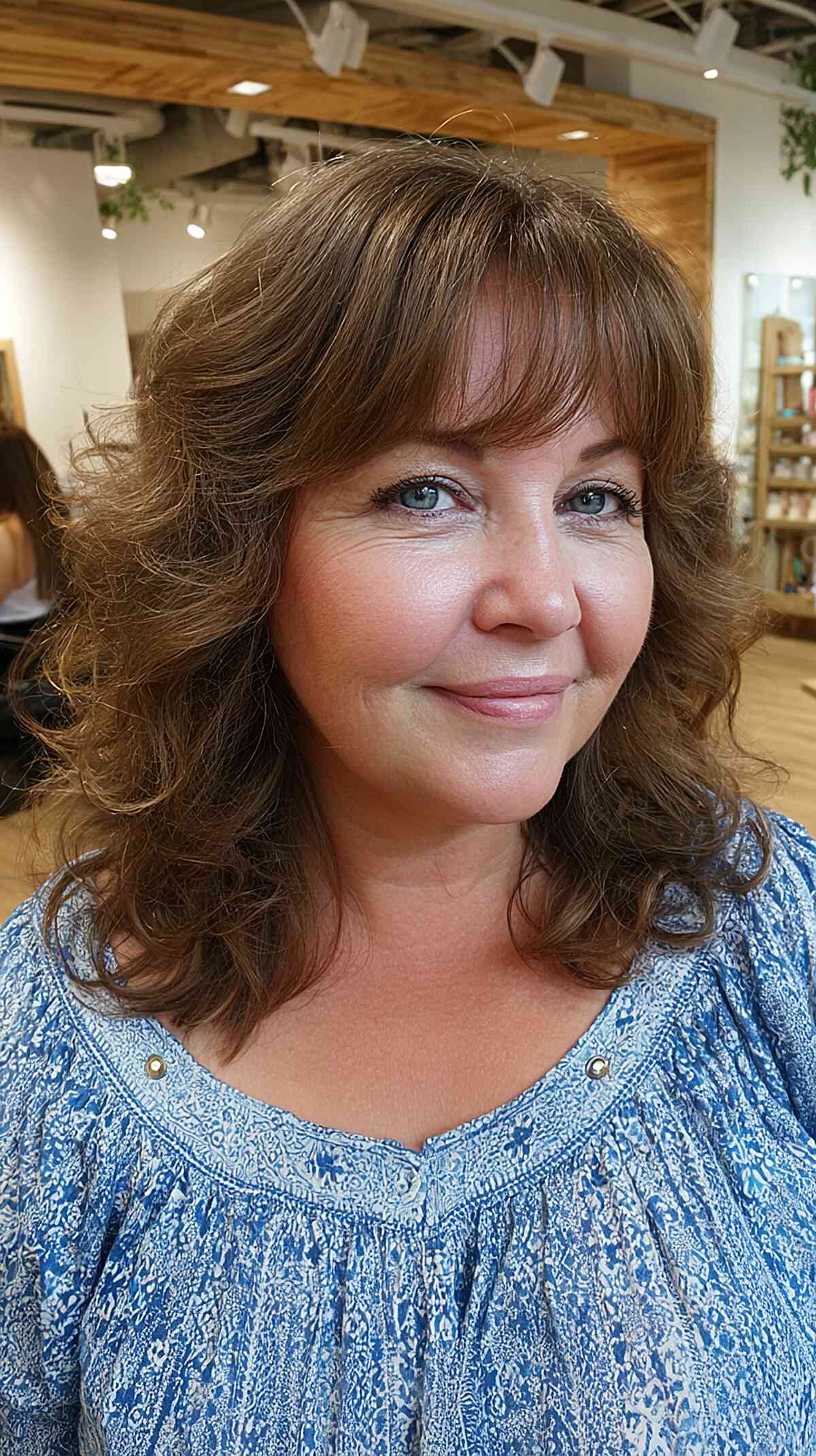 Soft Curly Layers with Wispy Bangs