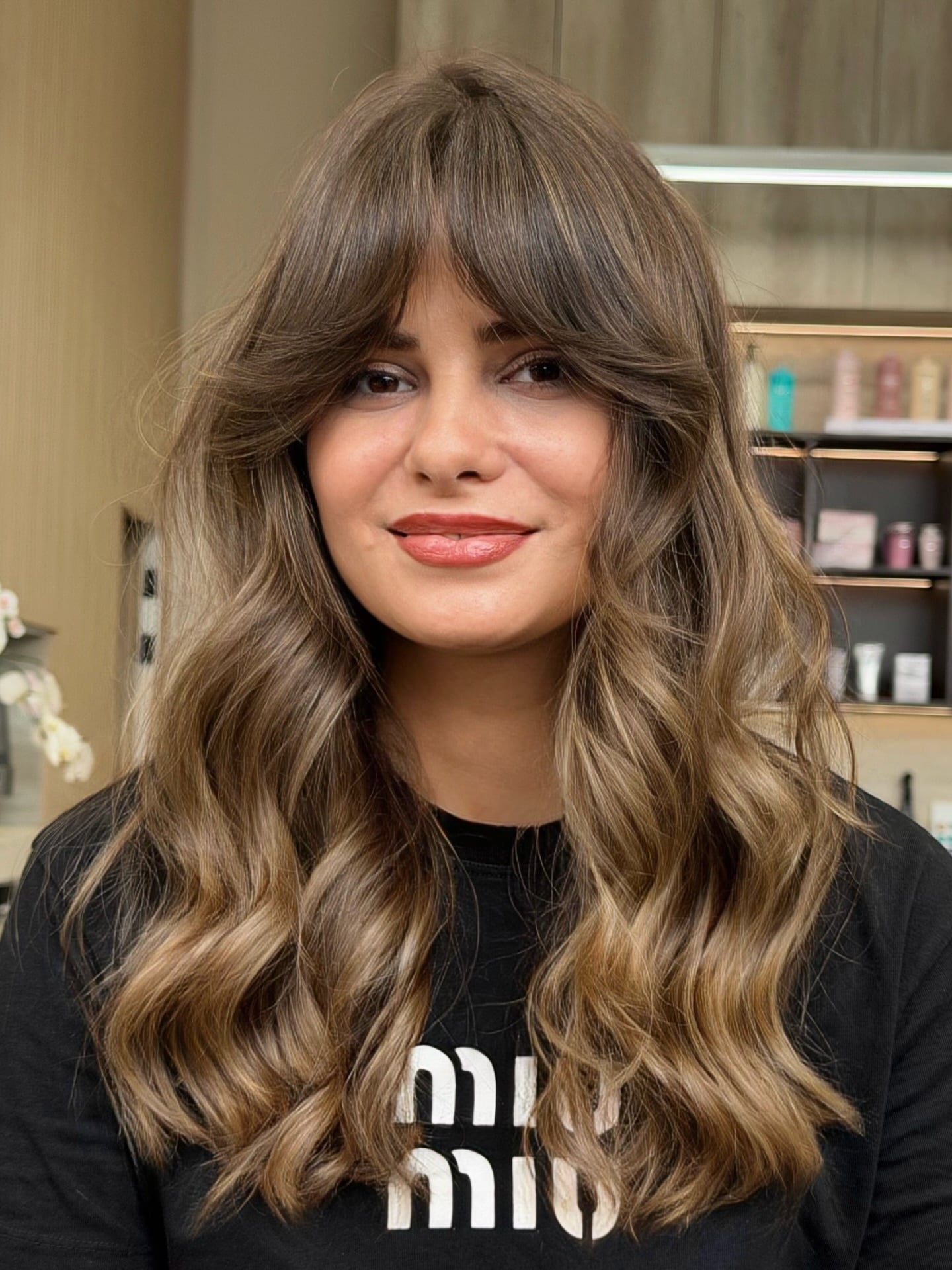 Soft Curtain Bangs with Face-Framing Layers