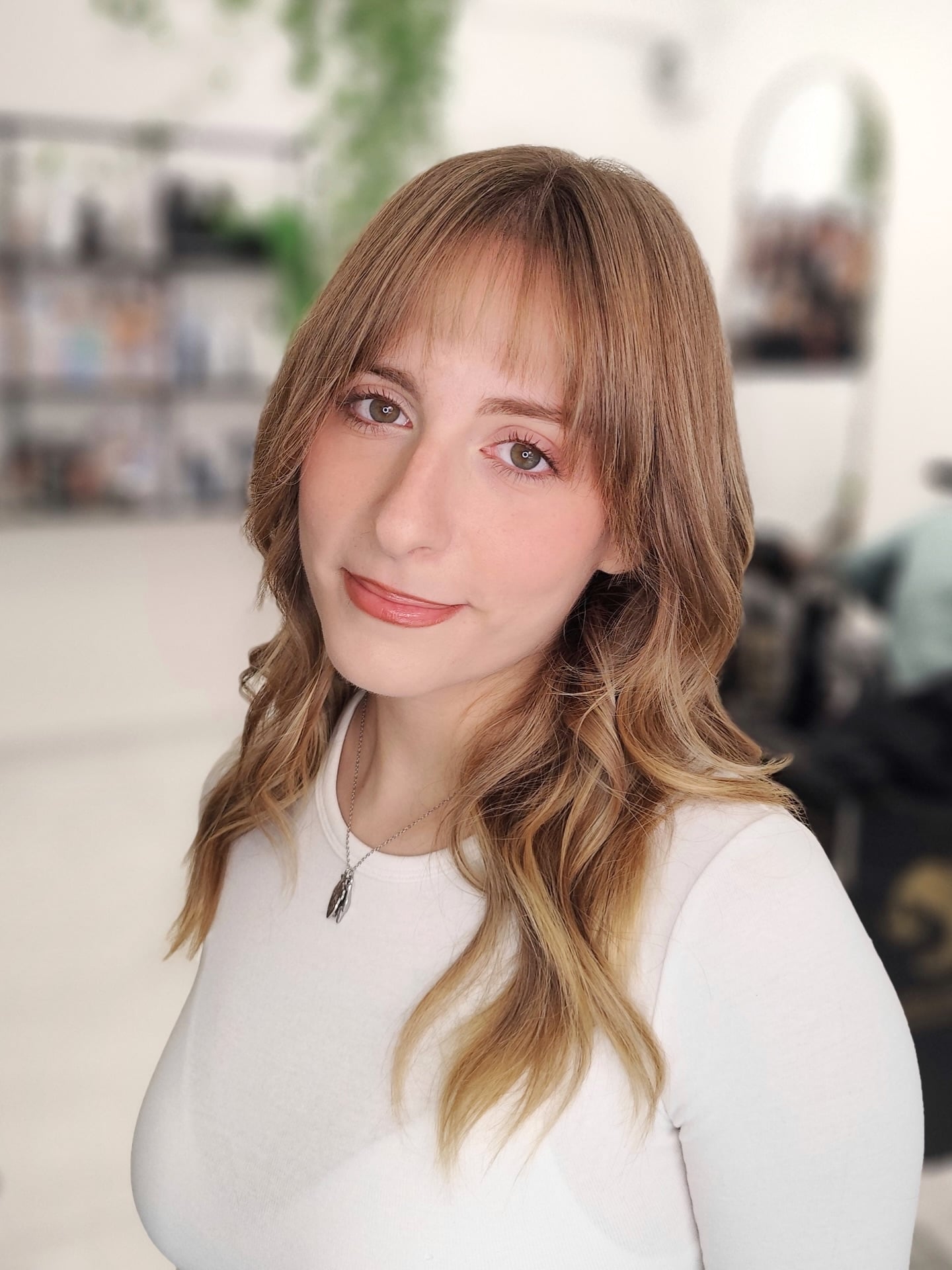 Soft Textured Curtain Bangs with Sun-Kissed Balayage