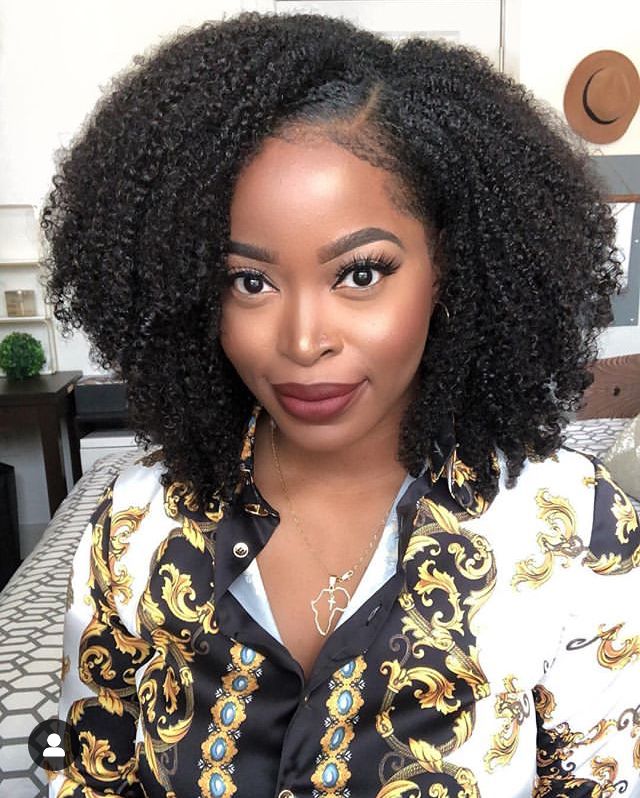 Forward-Weighted Side-Part Shoulder-Length Natural Curls