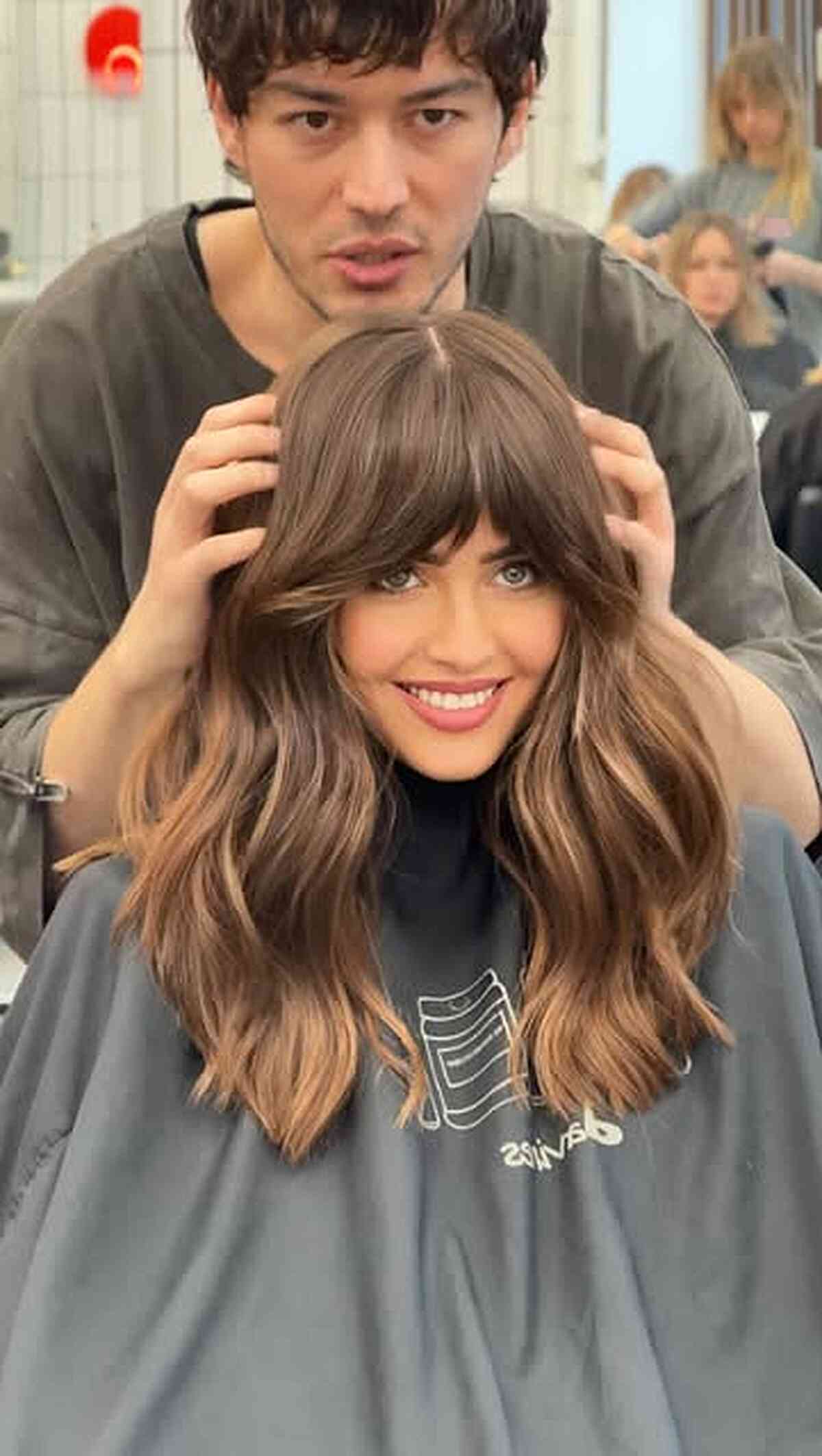 Layered Brunette Curtain Bangs with Soft Waves