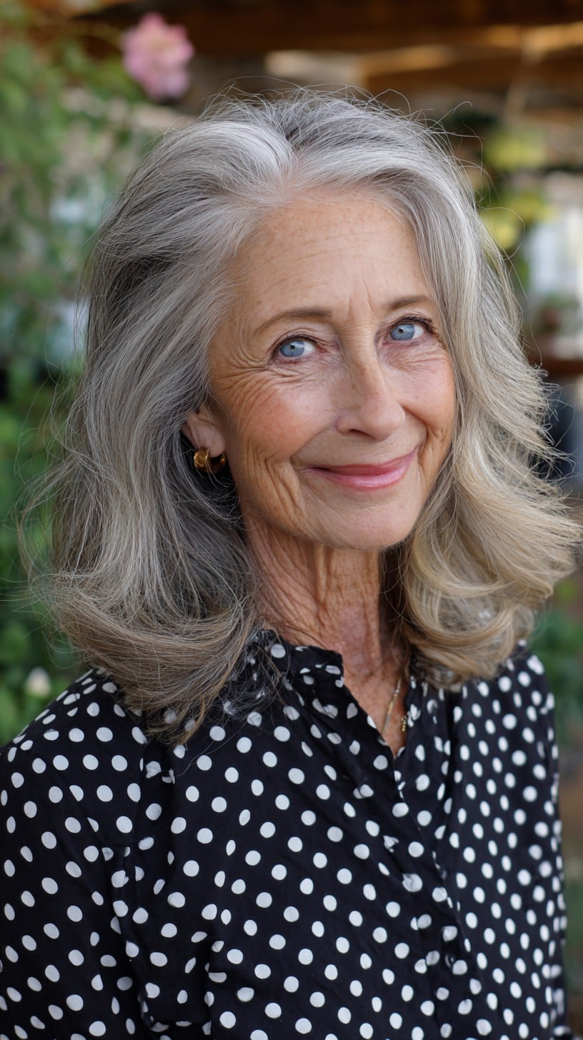 Rooted Silver Shoulder-Length Layers with Face-Framing Flip