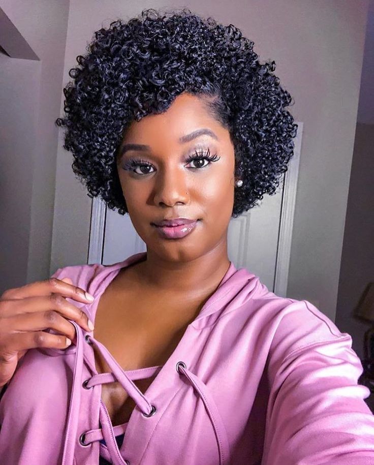 Rounded Finger-Coiled Short Afro with Defined Ringlets
