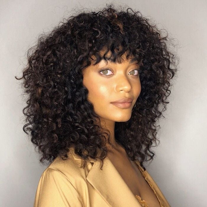 Shoulder-Length Curly Shag with Wispy Finger-Coiled Fringe
