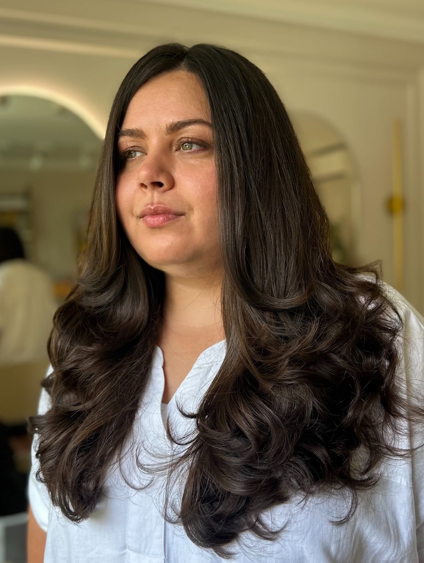 Sleek Deep Brunette Butterfly Layers with Soft Rounded Ends
