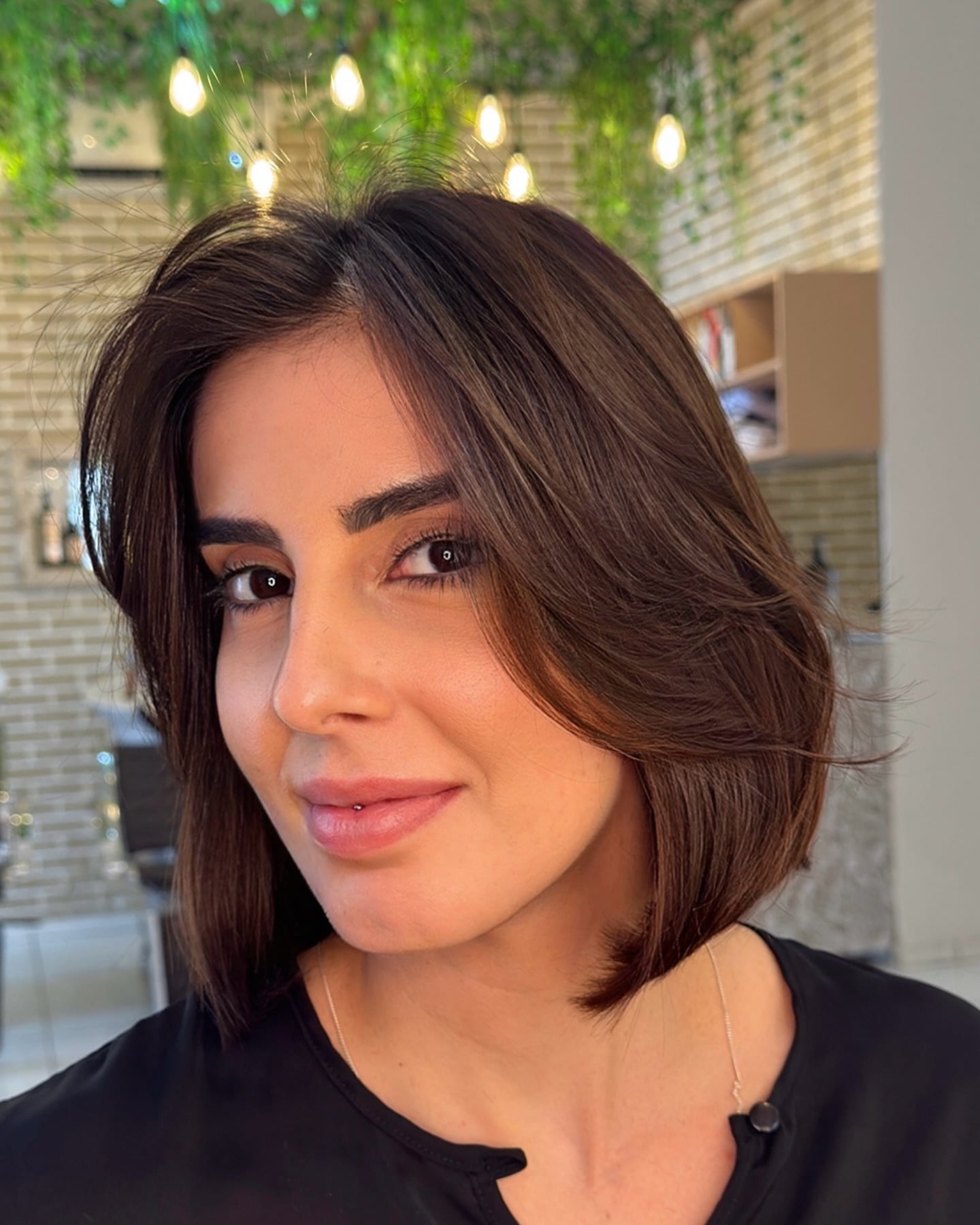 Soft Face-Framing Chin-Length Layered Bob with Inward Flip