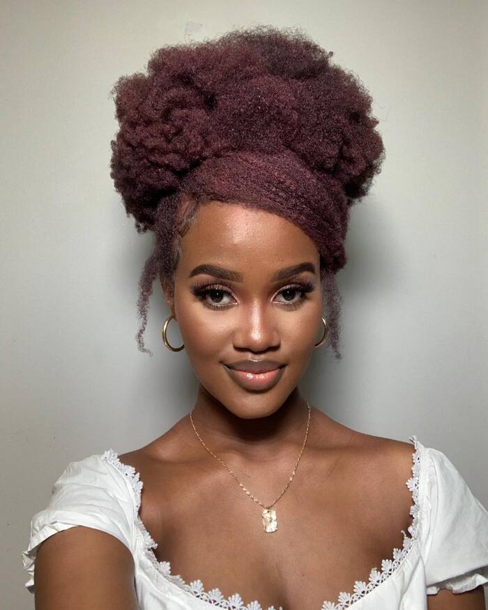 Voluminous Burgundy High Puff with Wrapped Frontal Band