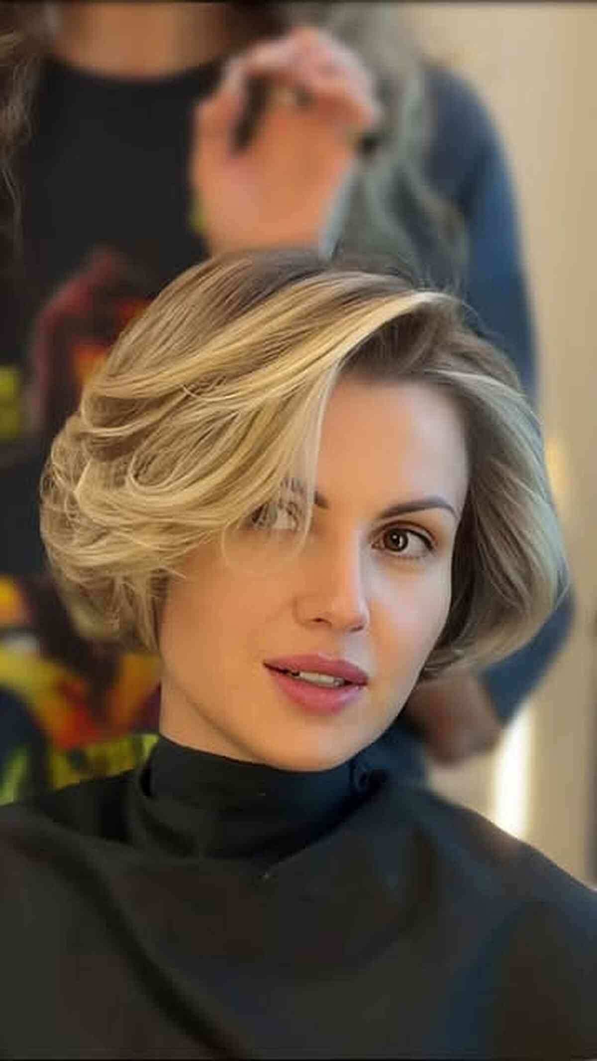 Voluminous Side Swept Layered Bob