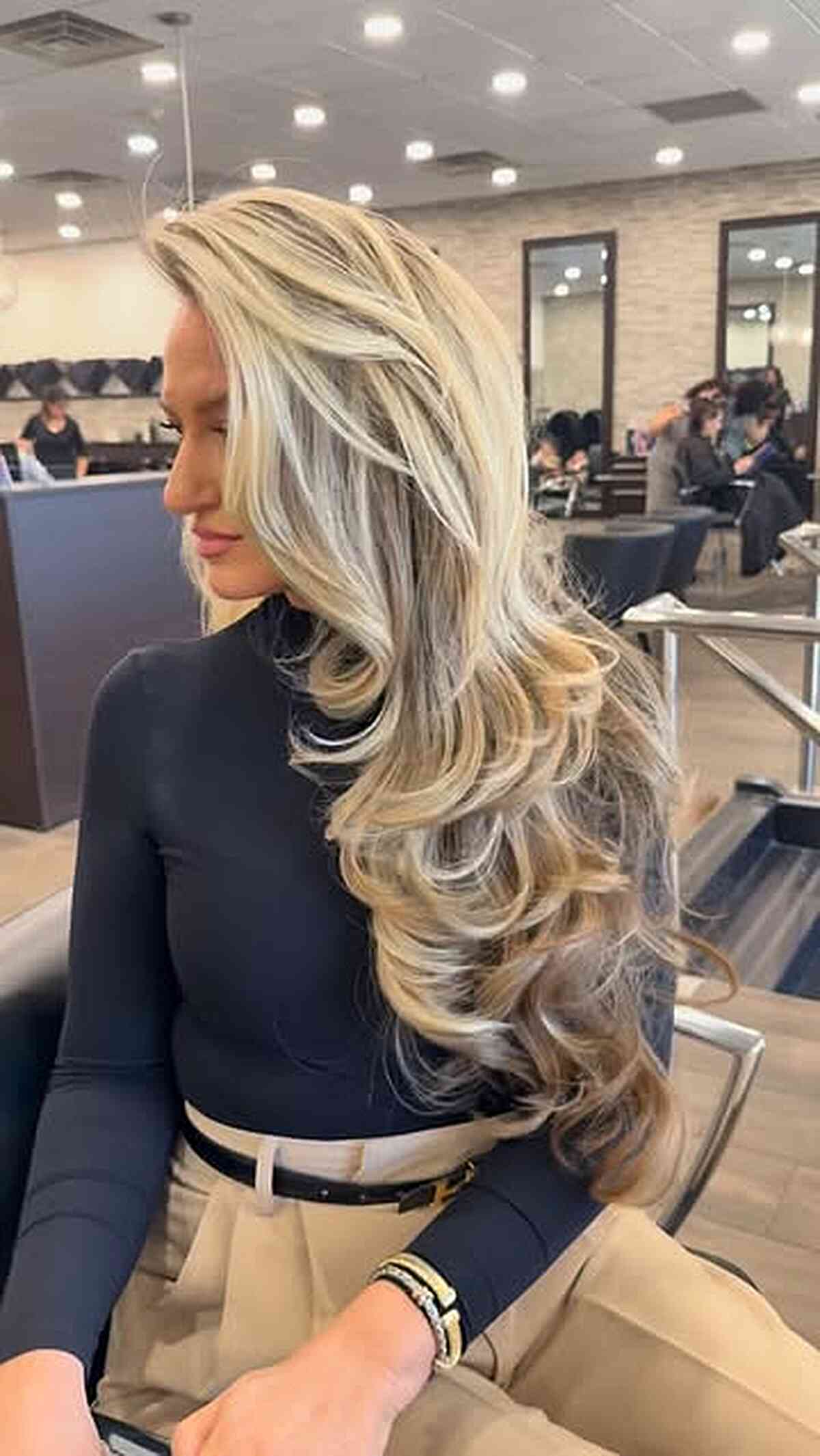 Elegant Layered Blonde Blowout with Soft Waves