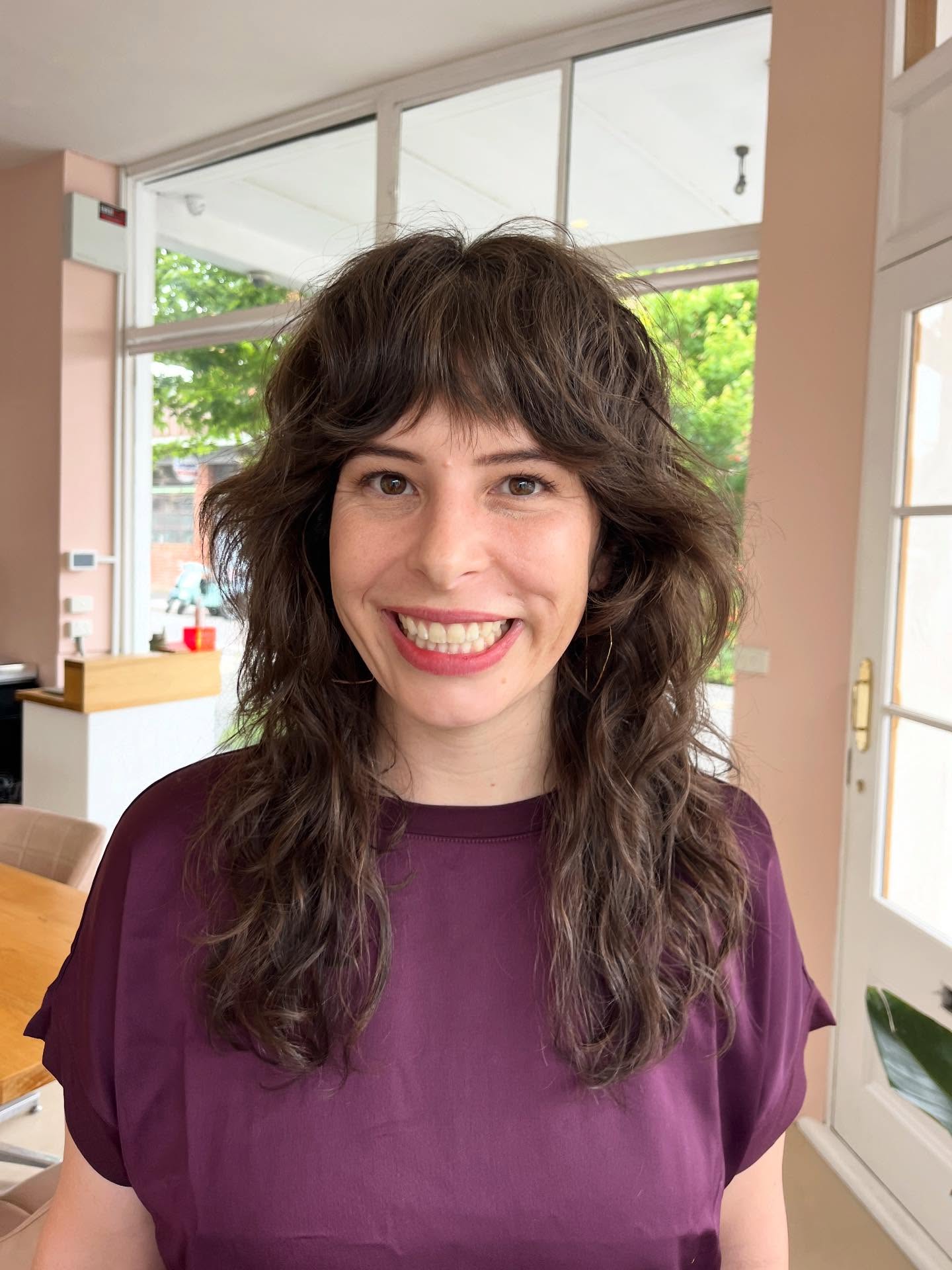 Tousled Layered Mullet-Shag with Wispy Curtain Fringe