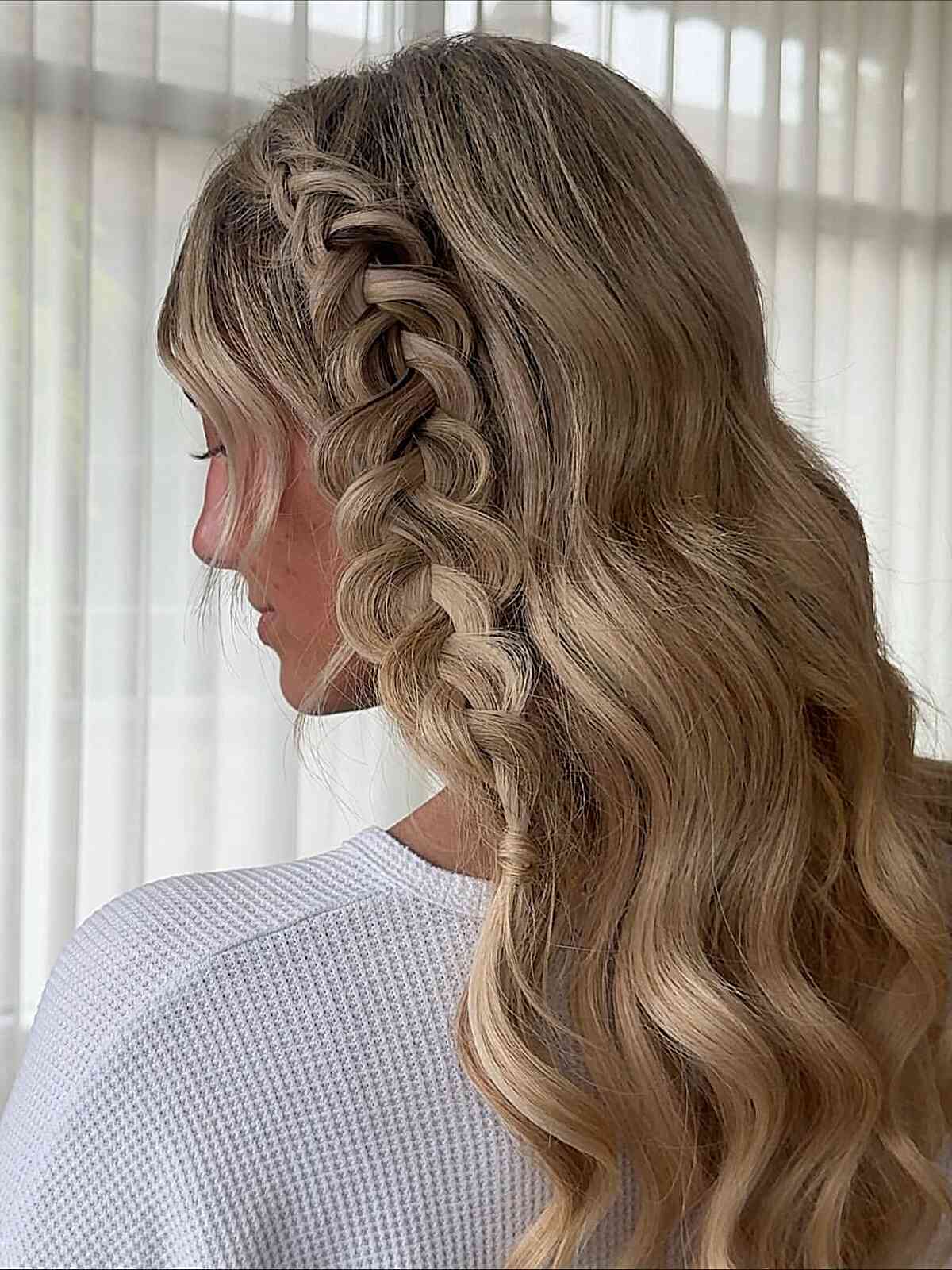 Boho-Inspired Loose Waves with Braided Accent
