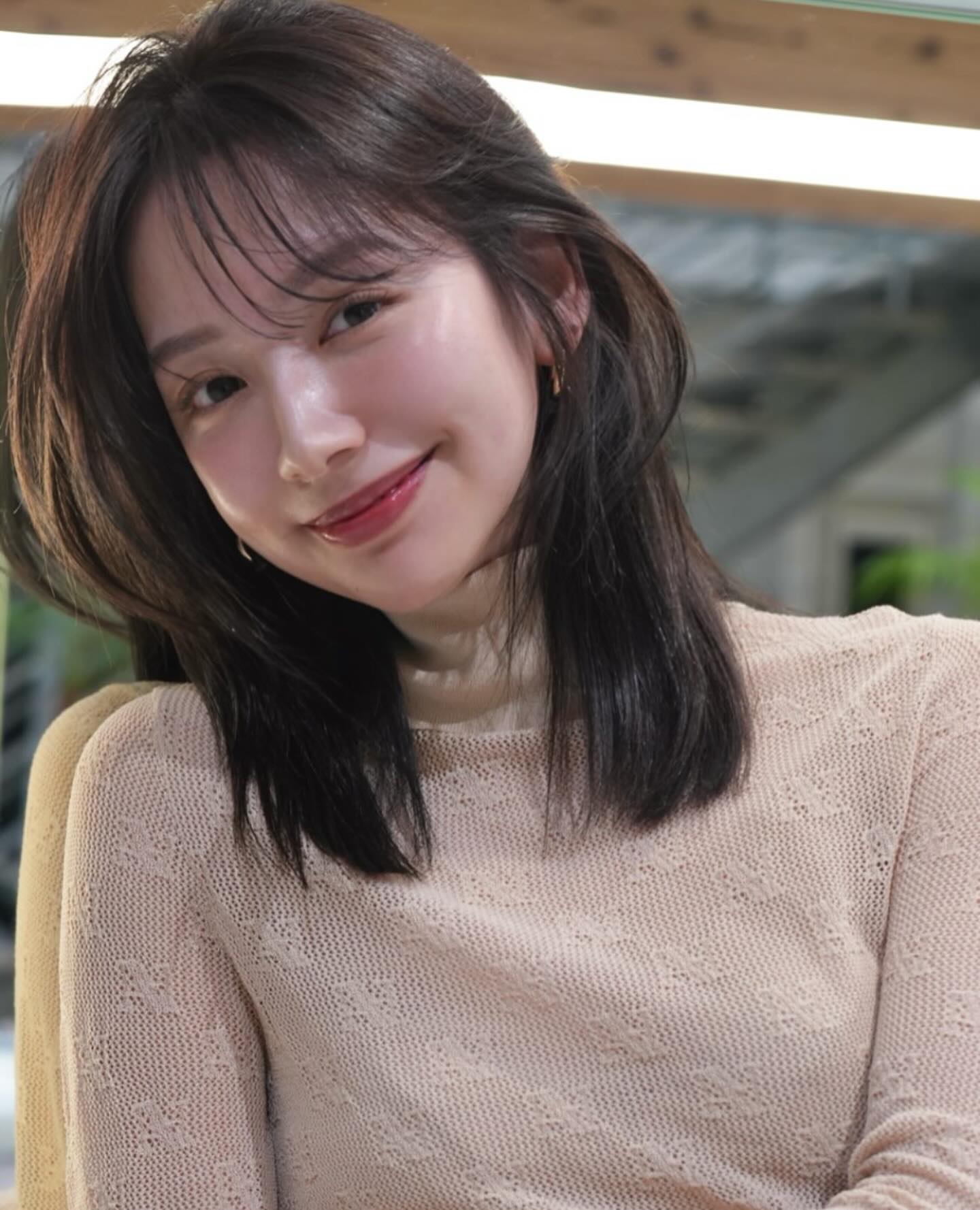 Airy Shoulder-Length Layers with Wispy Center-Part Fringe