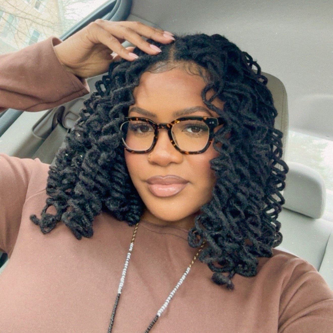 Chunky Collarbone-Length Palm-Rolled Locs with Springy Curled Ends
