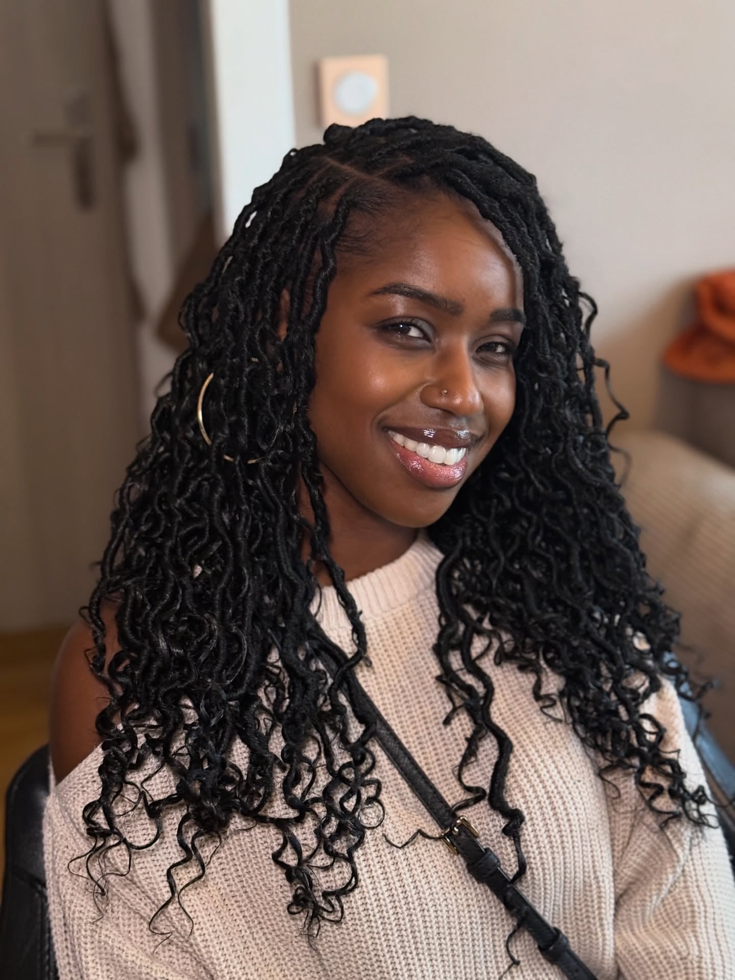 Layered Curly-Ended Goddess Locs with Diagonal Feed-In Part