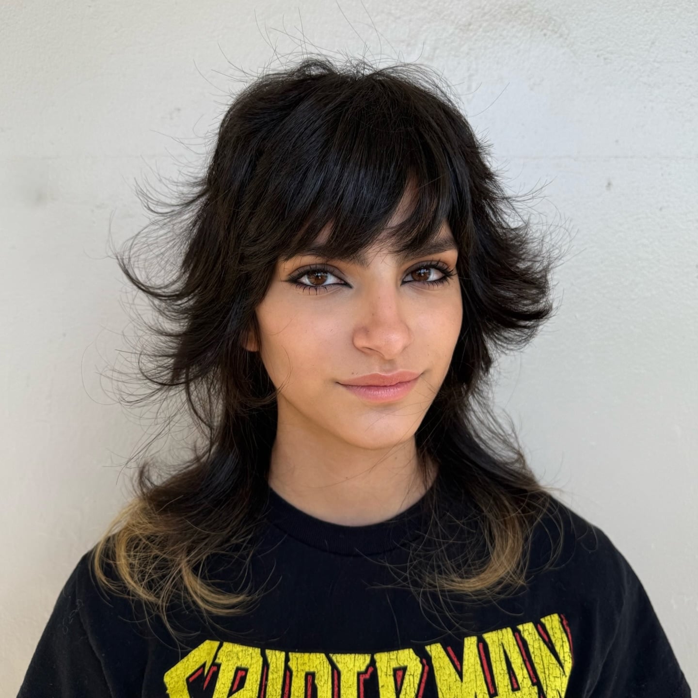 Modern Feathered Shag with Textured Brow-Skimming Fringe and Hidden Lighter Ends
