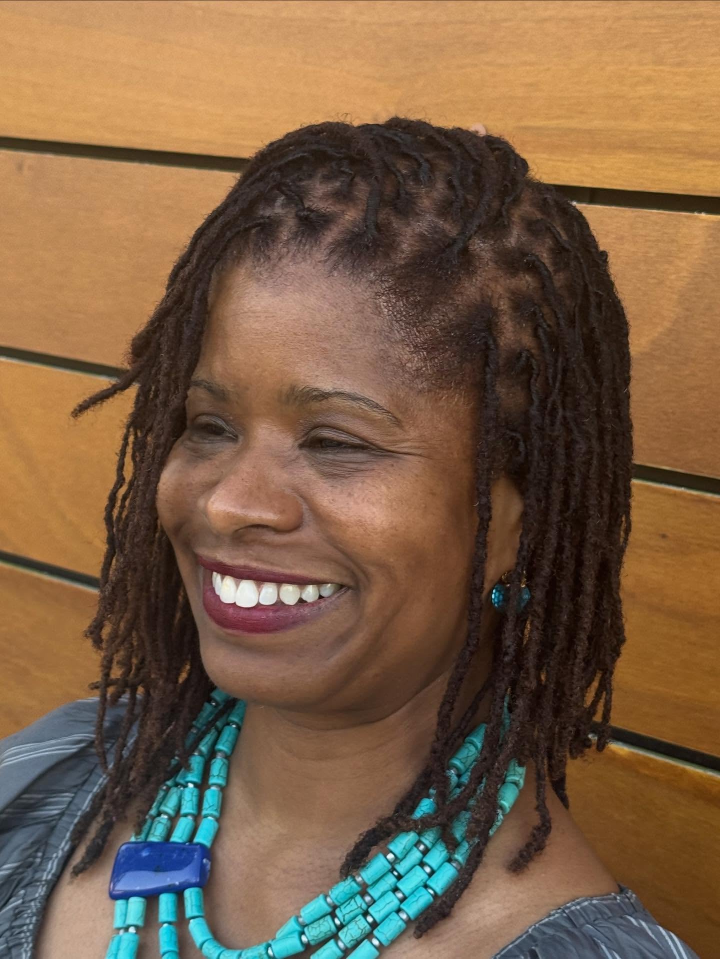 Shoulder-Grazing Micro Locs with Neat Grid Parting and Tapered Line