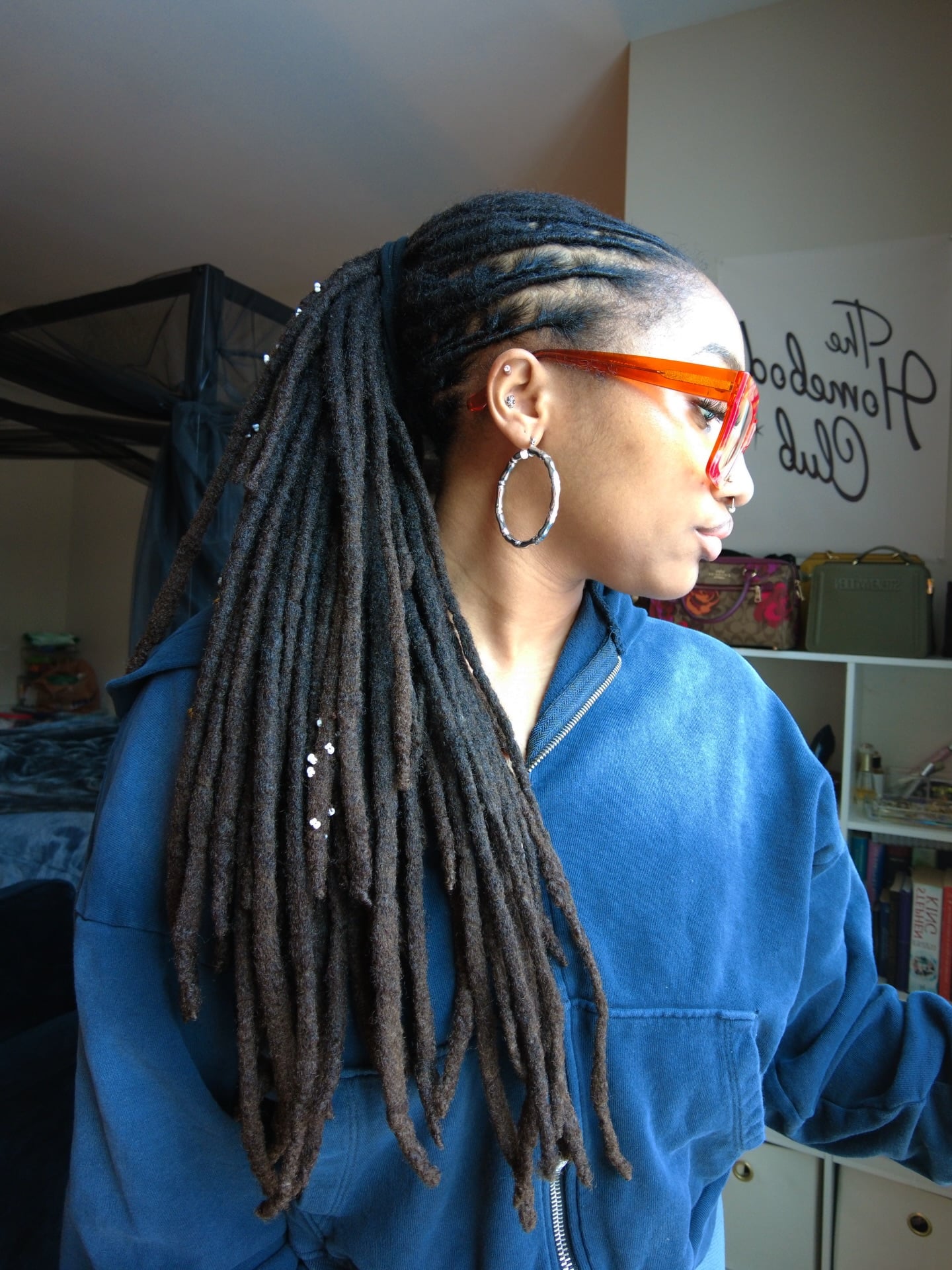 Sleek Side-Feed High Ponytail with Beaded Palm-Rolled Locs
