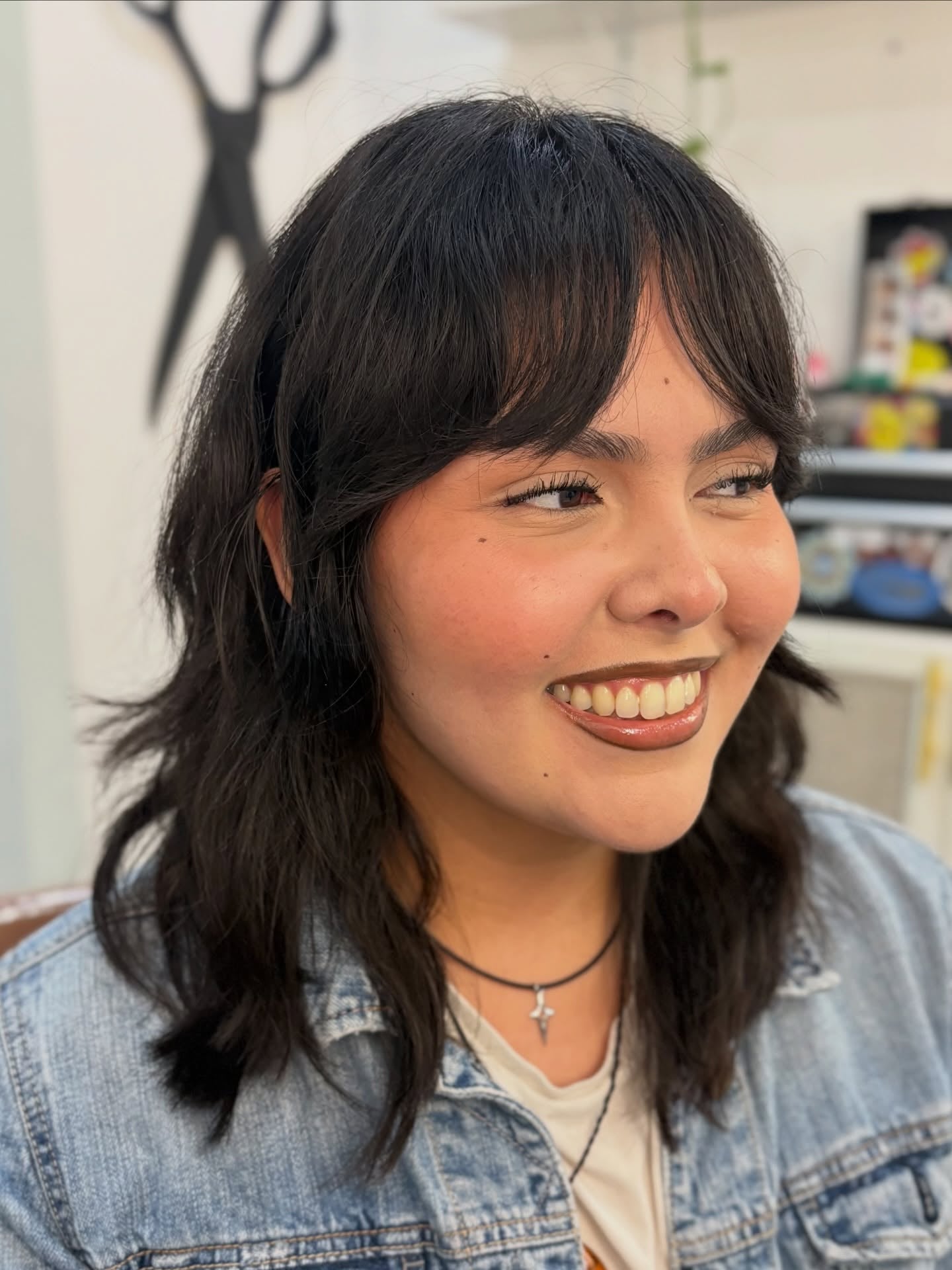 Textured Mid-Length Shag with Slightly Flipped Curtain Bangs