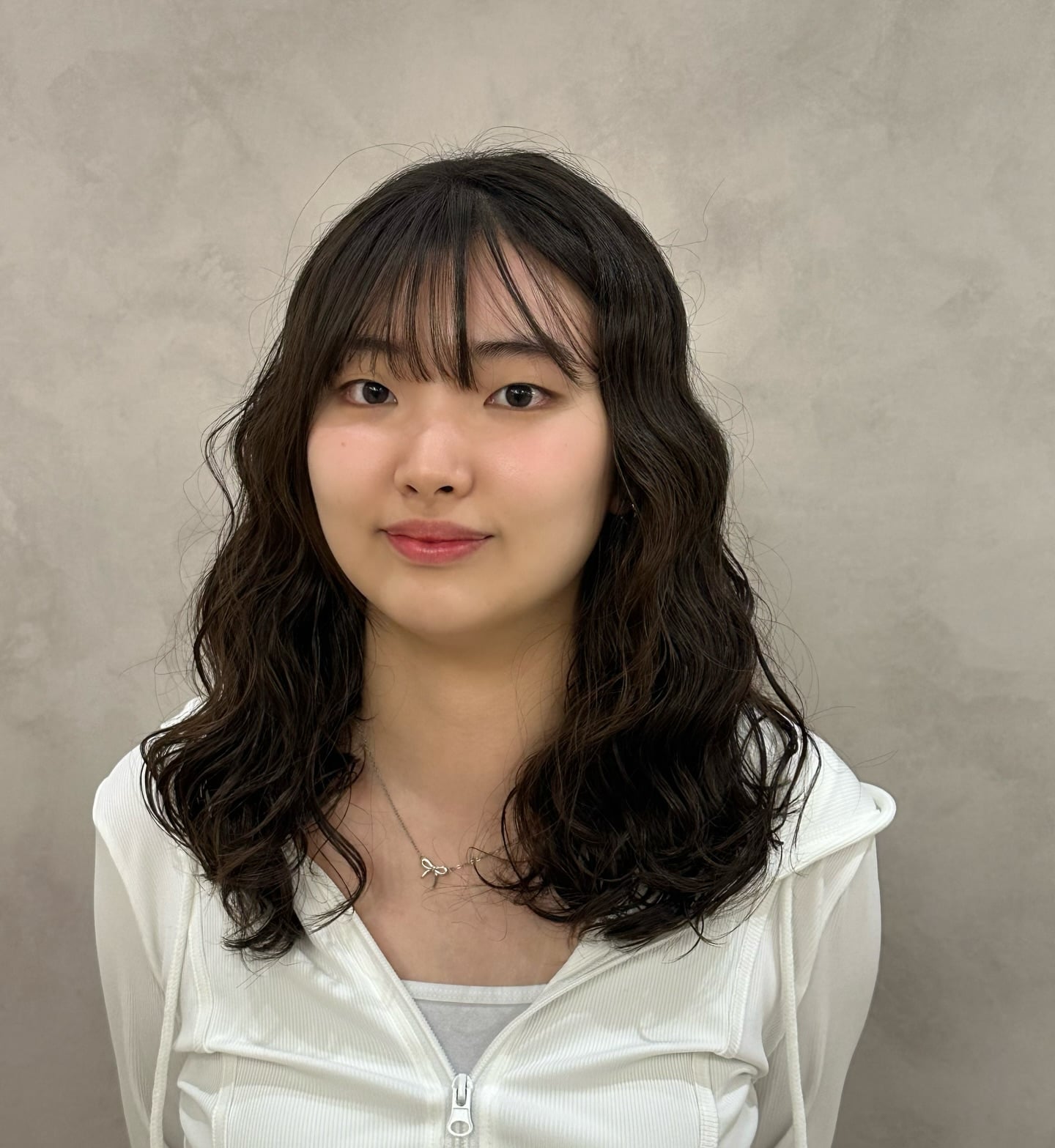 Wavy Shoulder-Length Cut with Sheer See-Through Bangs