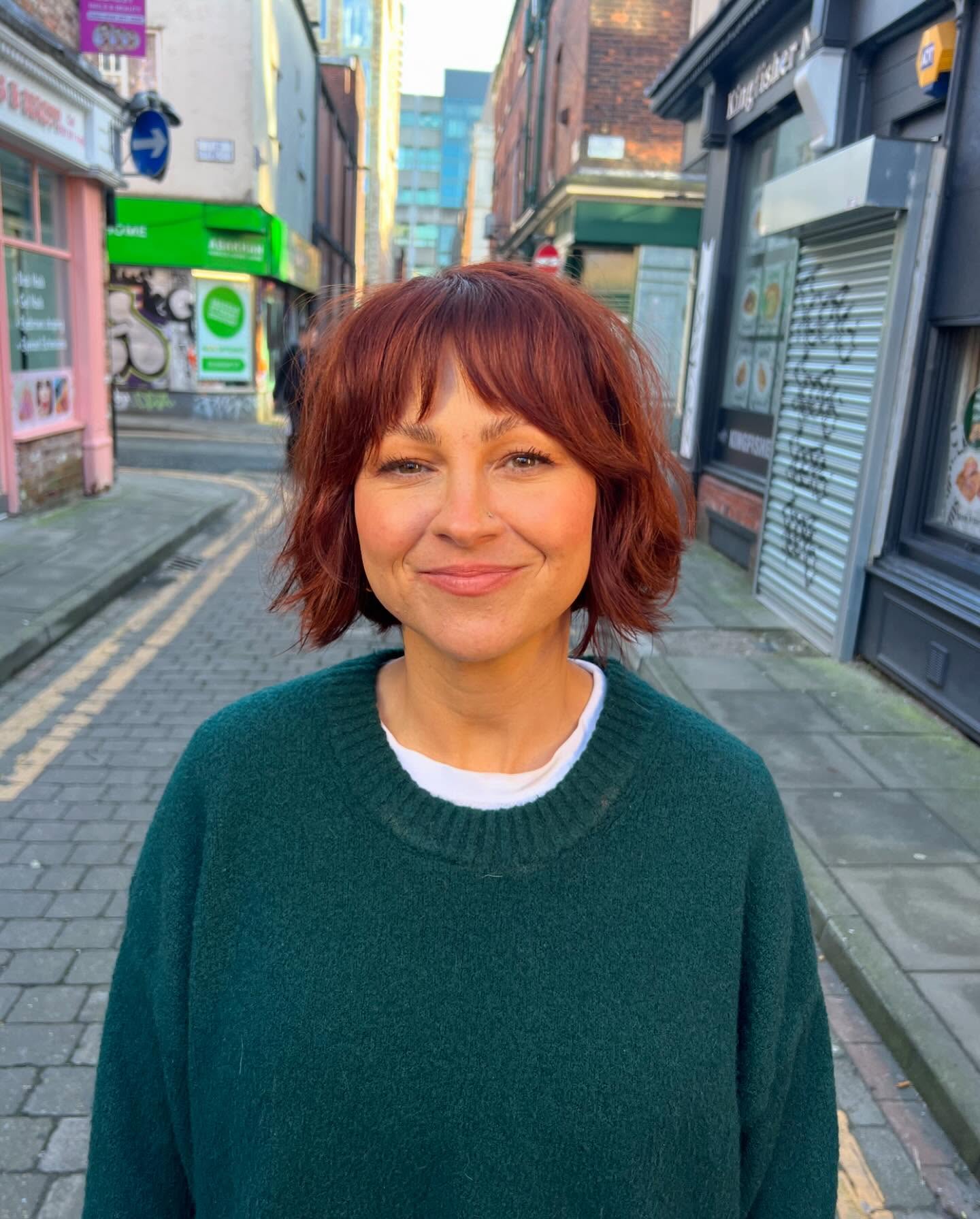 Auburn Jaw-Grazing Choppy Bob with Soft Feathered Fringe