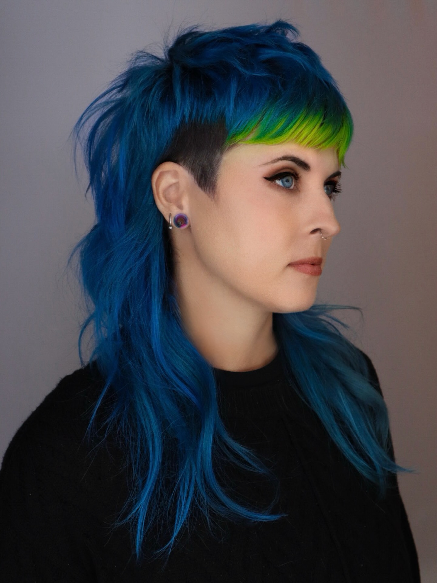 Bold Electric Blue Shag Mullet with Neon Green Micro Fringe