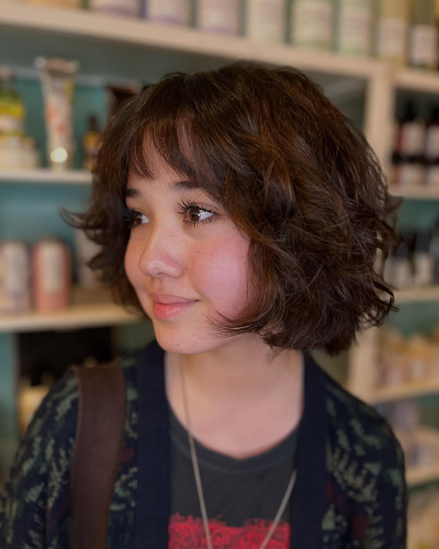 Bouncy Jaw-Length Choppy Bob with Short Curtain Bangs