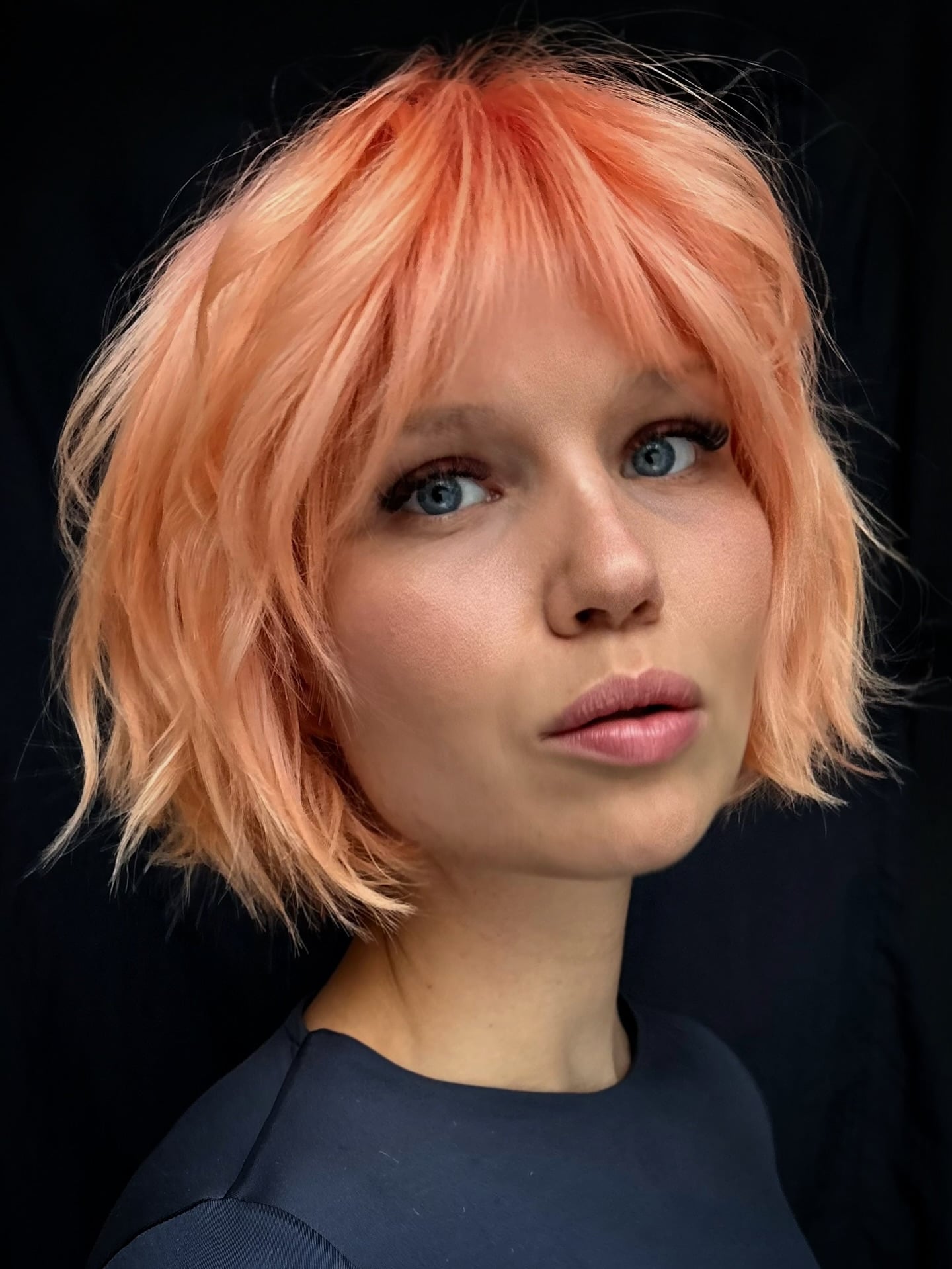 Peach-Pastel Choppy Jaw-Length Bob with Micro Fringe