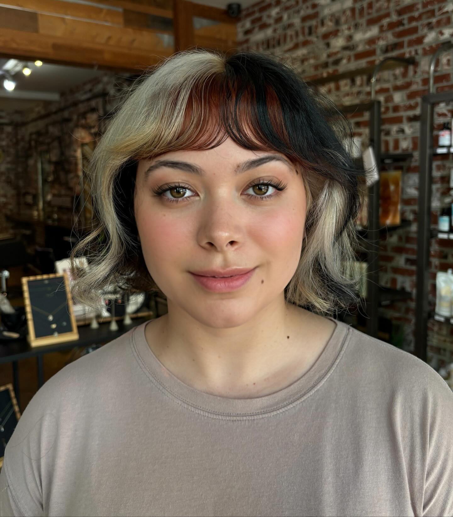 Split-Color Choppy Jaw-Grazing Bob with Feathered Micro Fringe
