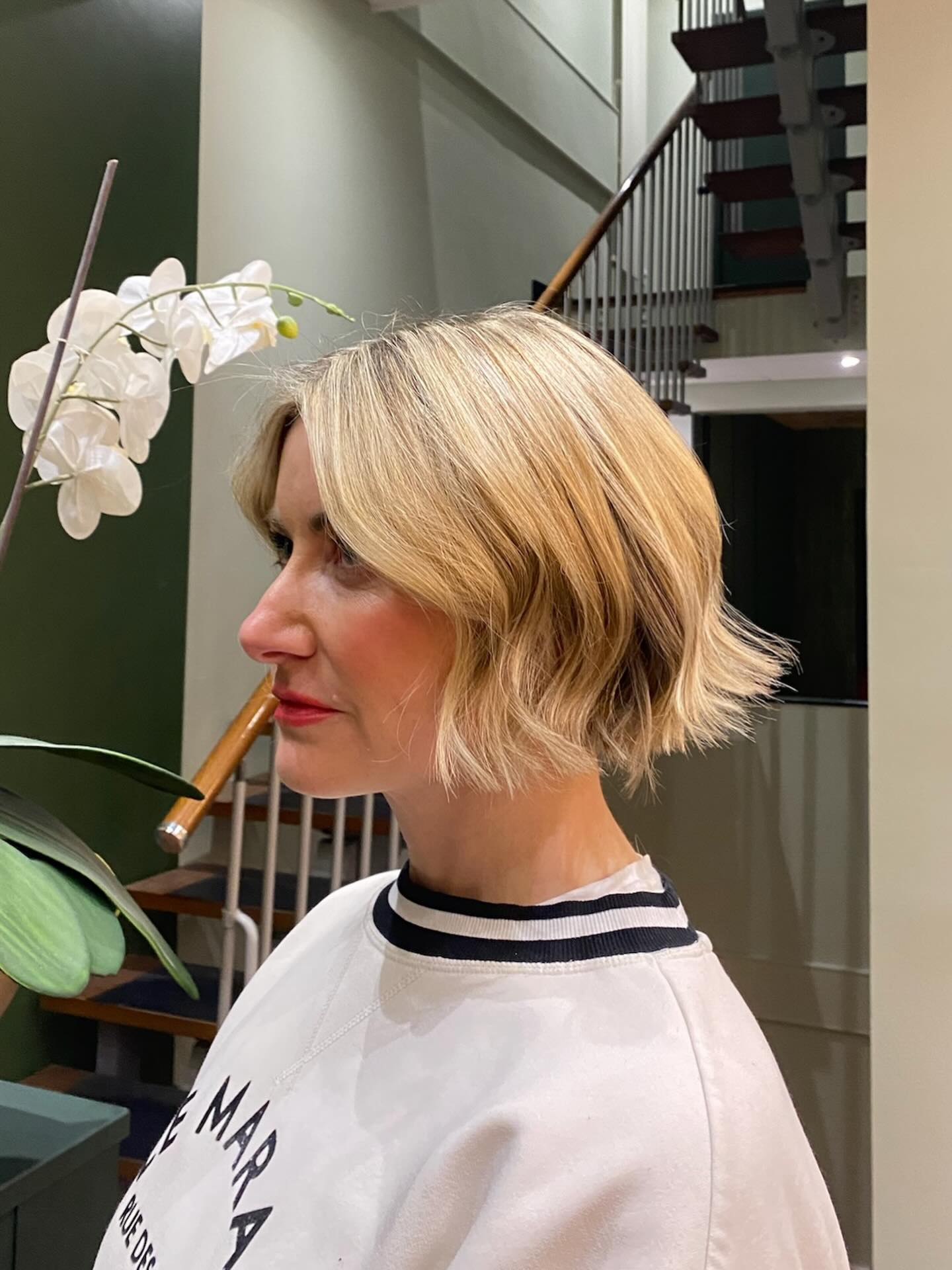 Textured Jaw-Length Blonde Bob with Curtain Part