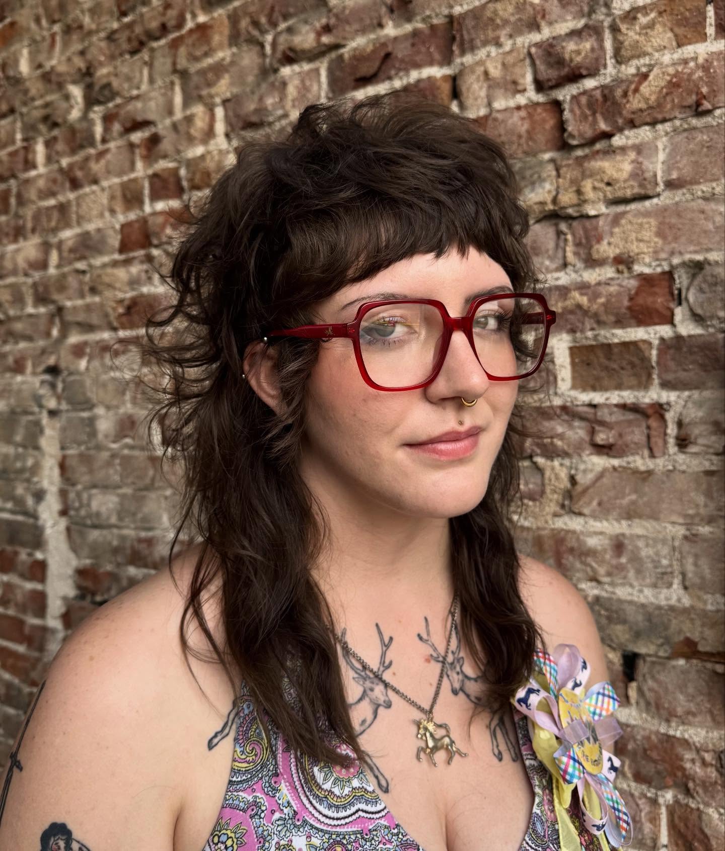 Tousled Layered Mullet with Short Choppy Fringe and Feathered Crown