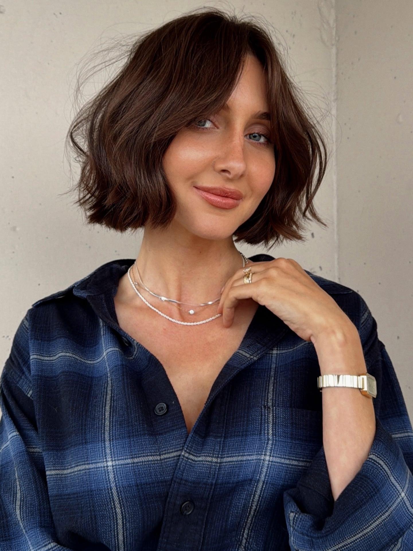 Chic Textured Chocolate Chin-Length Bob with Curtain Fringe