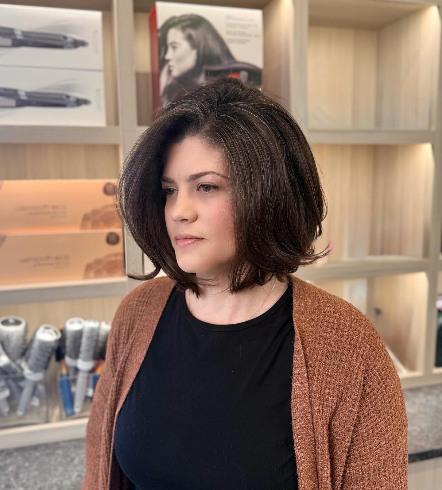 Round Stacked Chin-Grazing Bob with Root Lift and Salt-and-Pepper Dimension