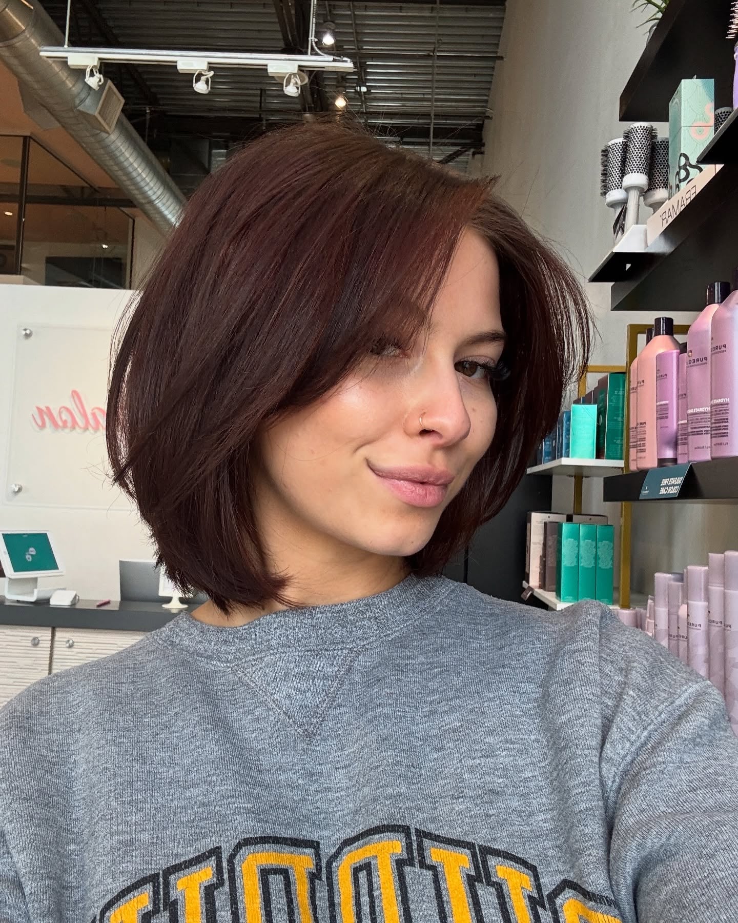 Warm Auburn Chin-Grazing Stacked Bob with Curtain Layers