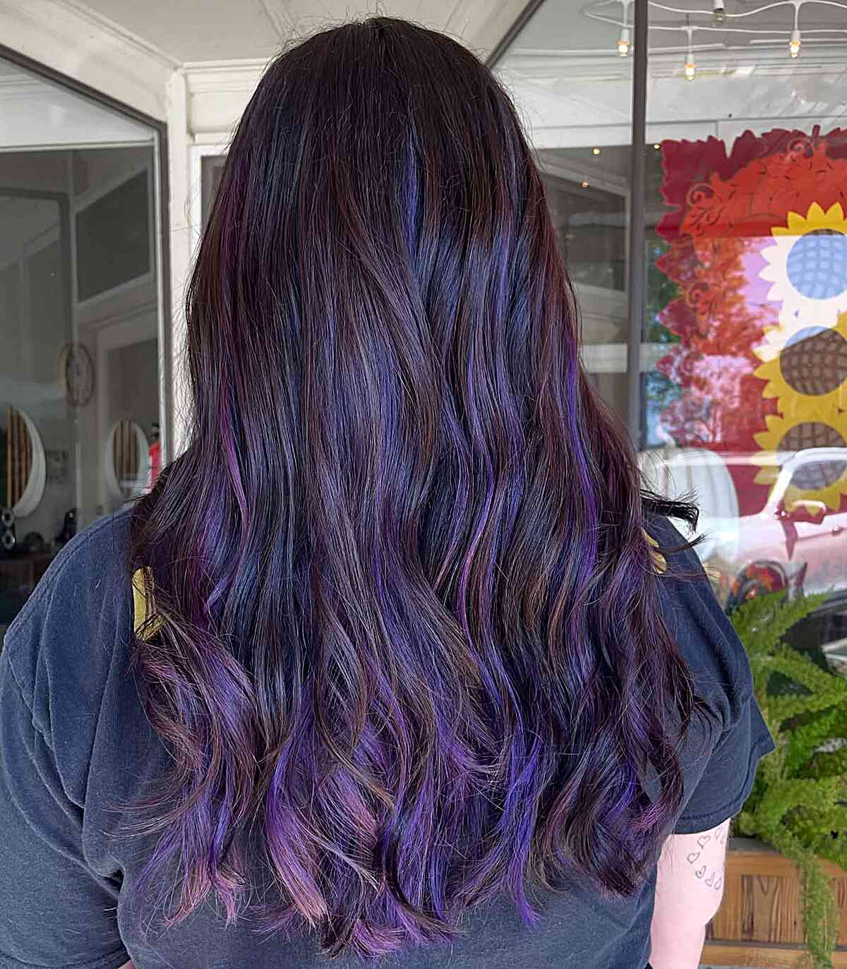 Long Wavy Hair with Vibrant Purple Highlights
