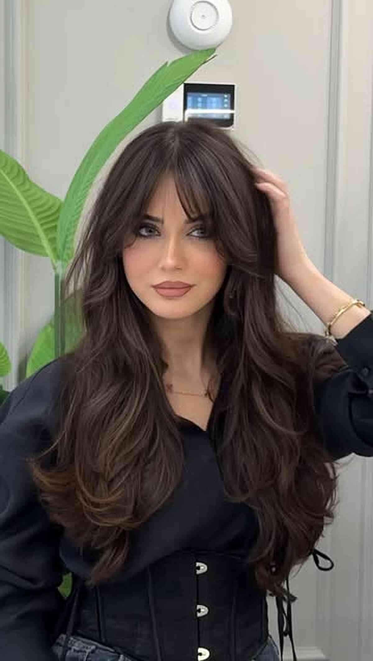 Long Brown Hair with Curtain Bangs and Layers