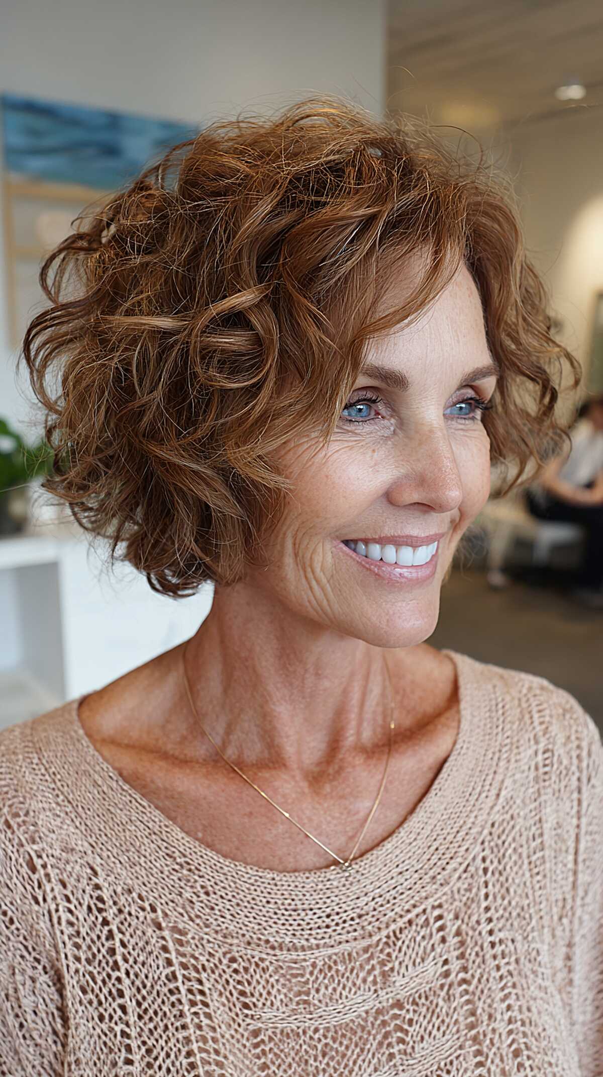 Auburn curly choppy bob with natural volume