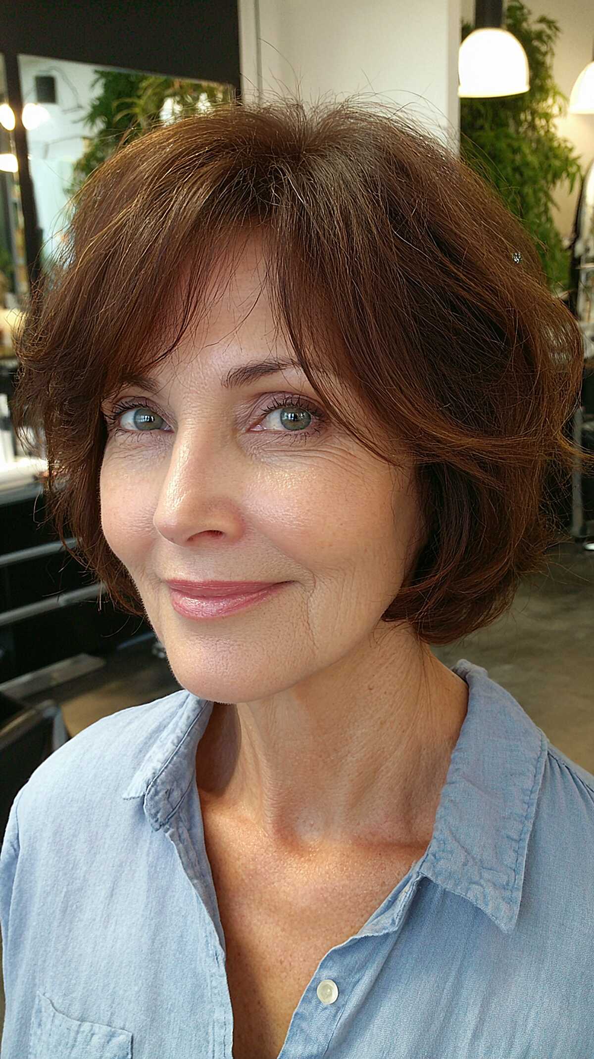 Chestnut volume choppy bob with swooping bangs