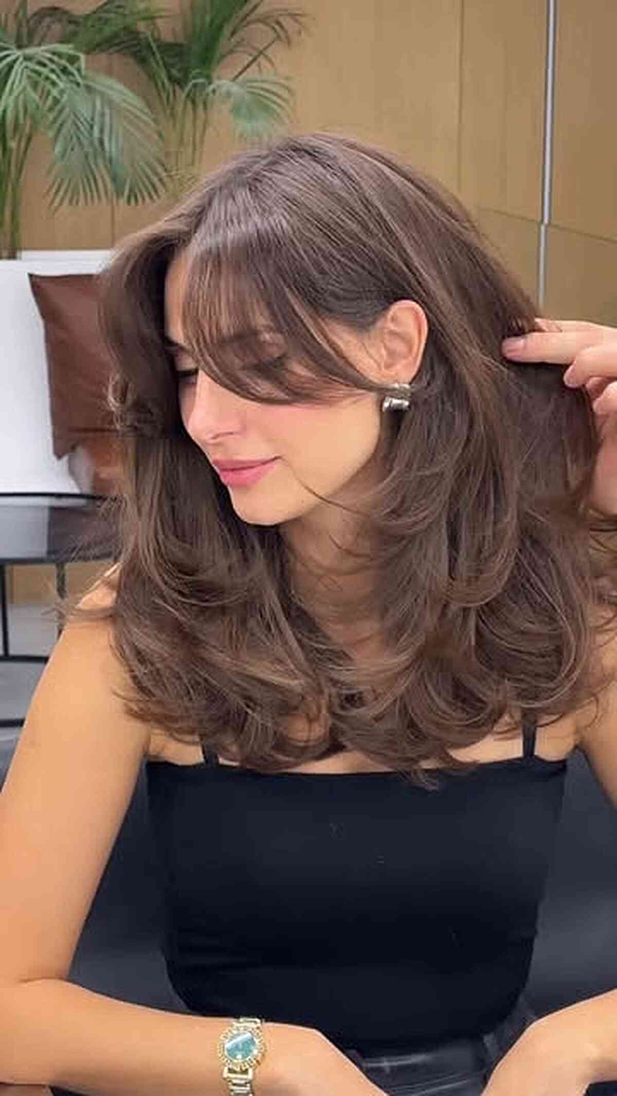 Long Brown Hair with Curtain Bangs and Layers