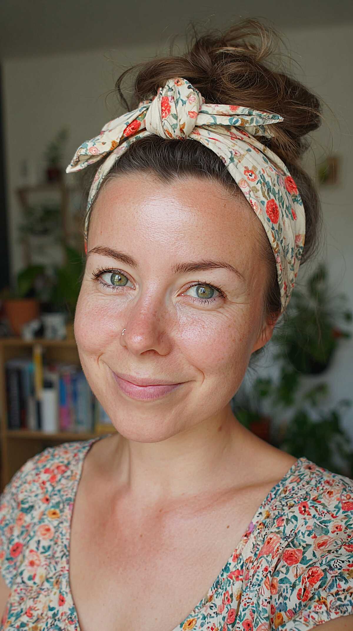 High messy bun with floral knotted headscarf