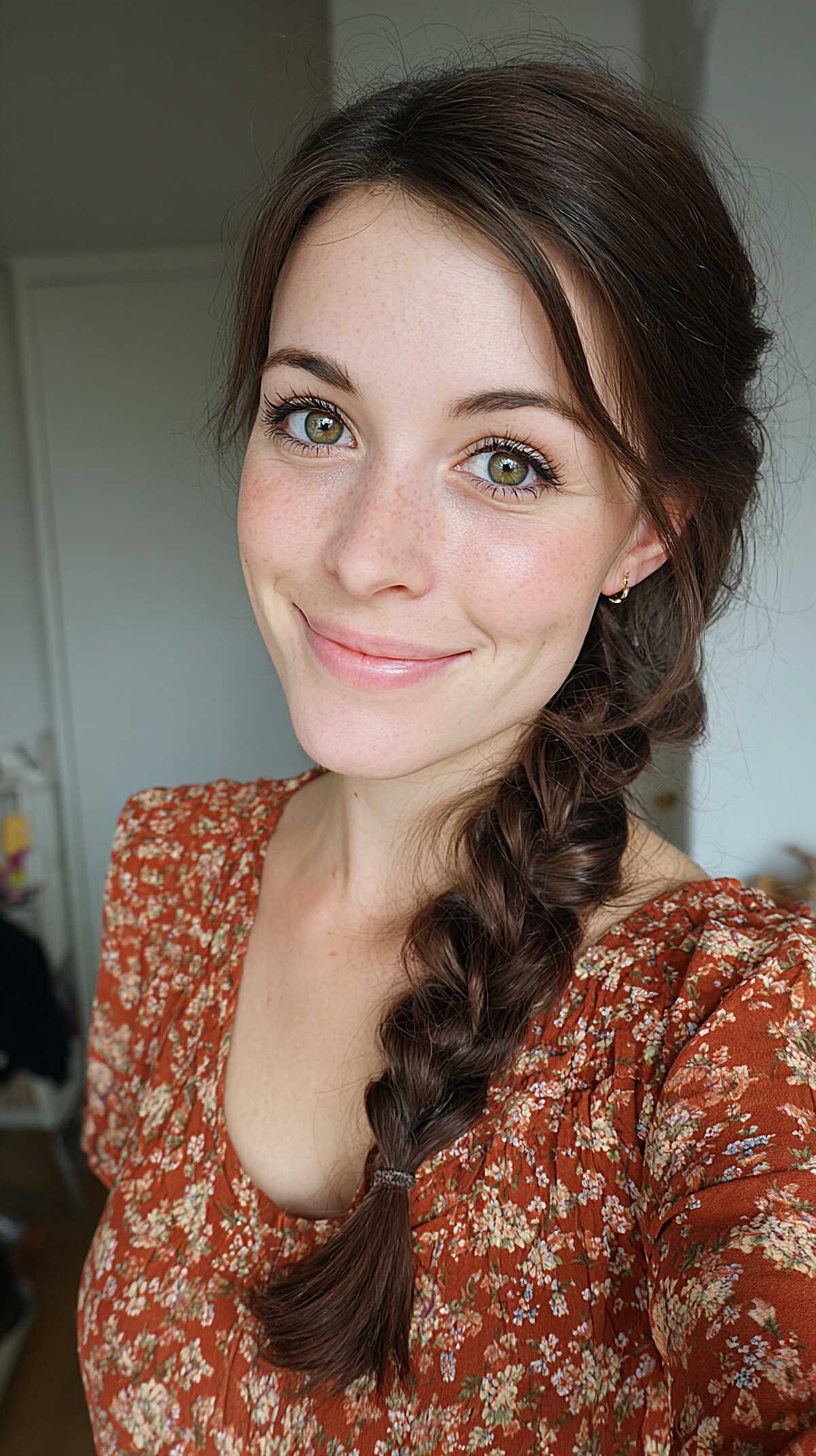 Dark brown side fishtail braid with loose front pieces