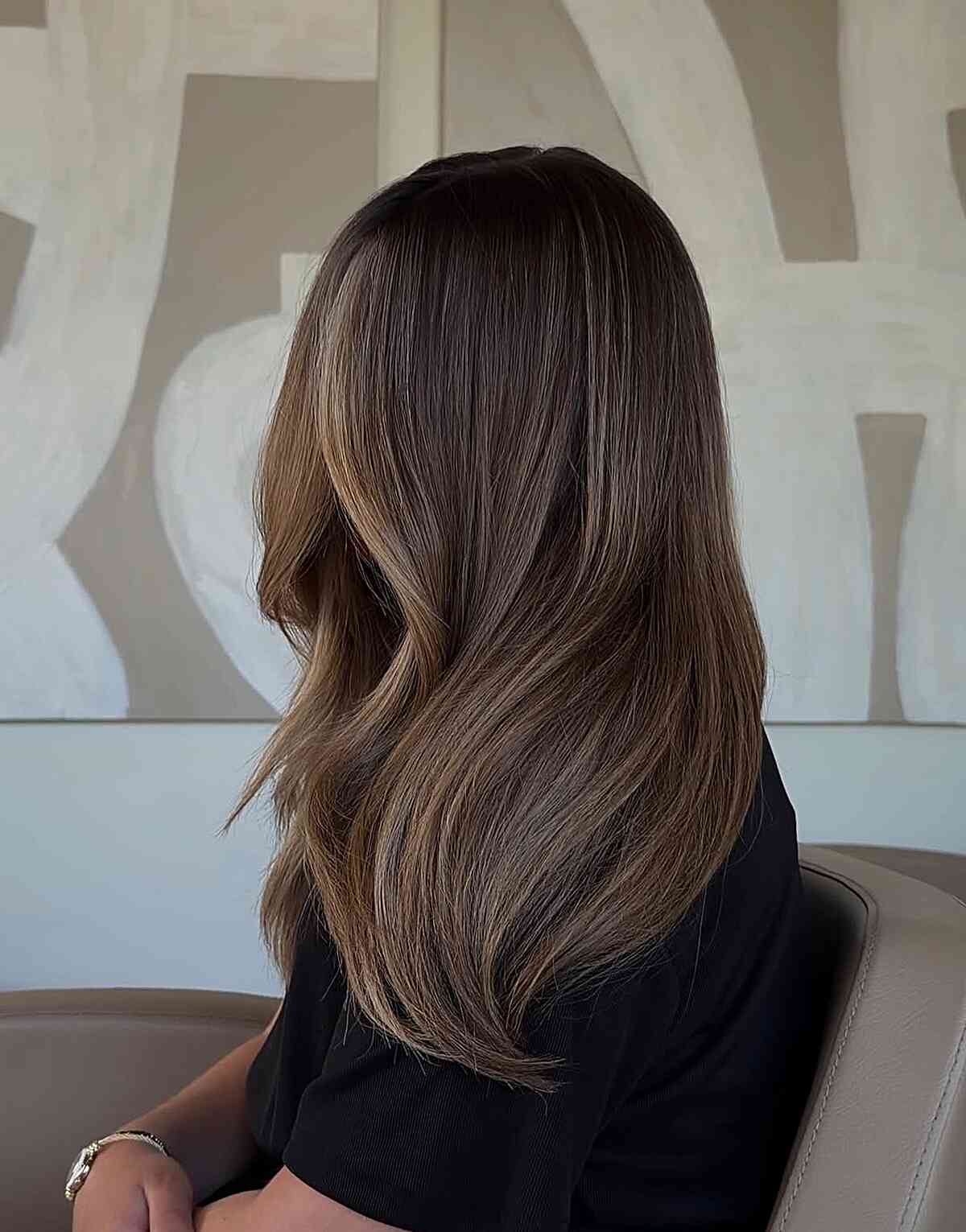 Rich Brunette with Blonde Highlights and Soft Waves