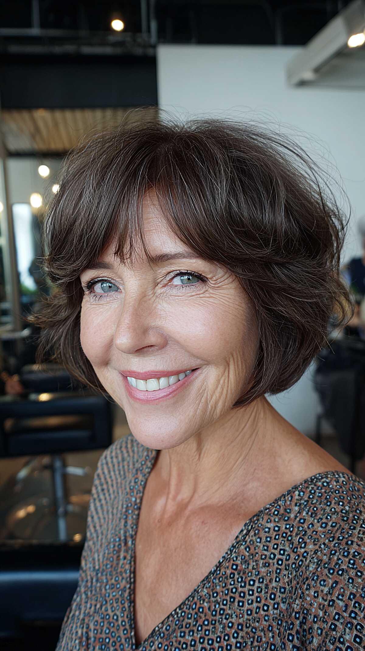 Dark brown polished bob with swoopy curtain bangs