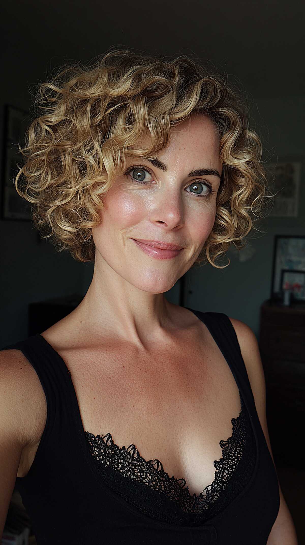 Blonde short curly bob with defined golden ringlets