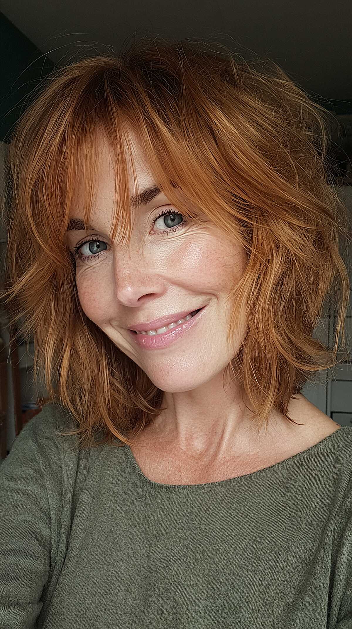 Copper ginger shaggy bob with tousled waves