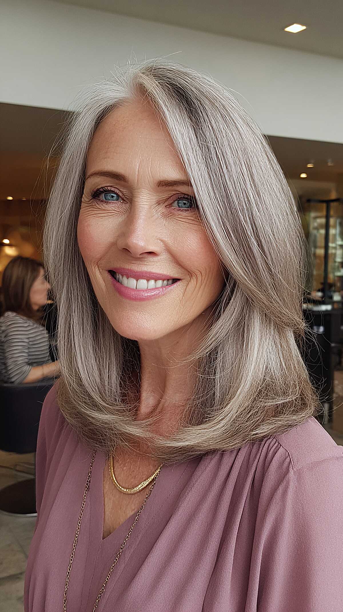 Feathered silver platinum layers at shoulder length