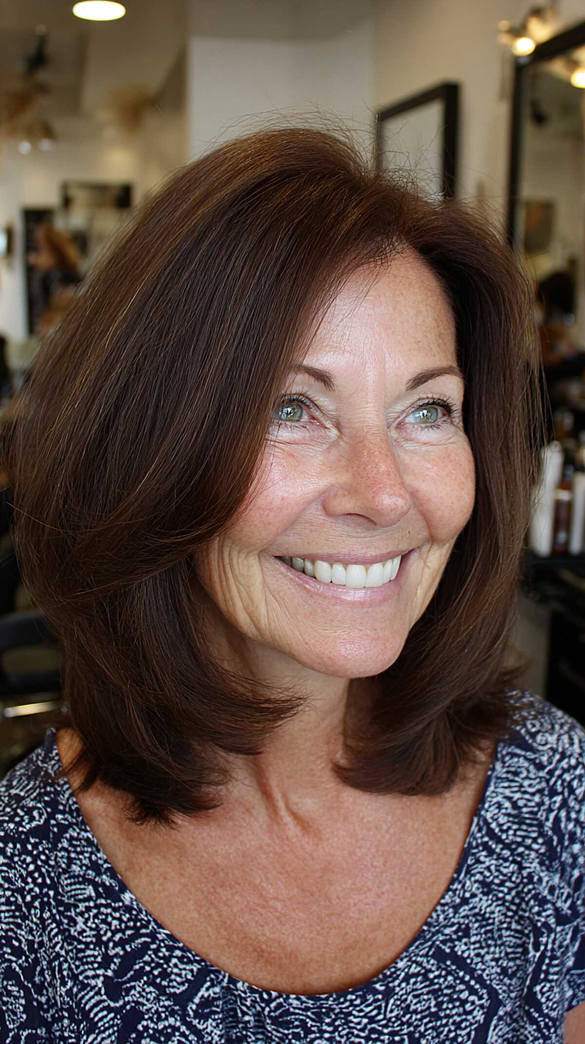 Full volume chocolate brown blowout bob with bounce