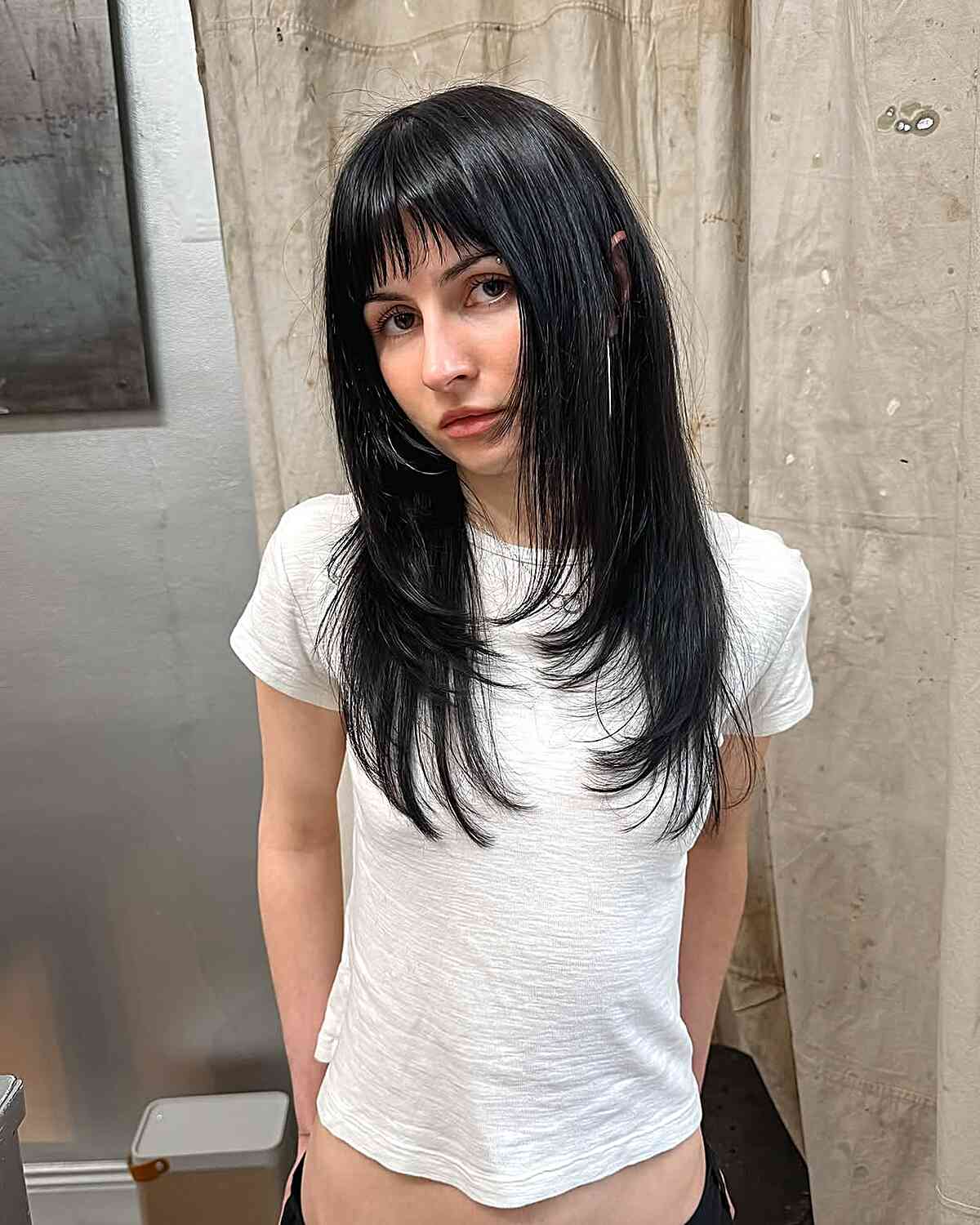 Modern Wispy Bangs with Long Layered Locks