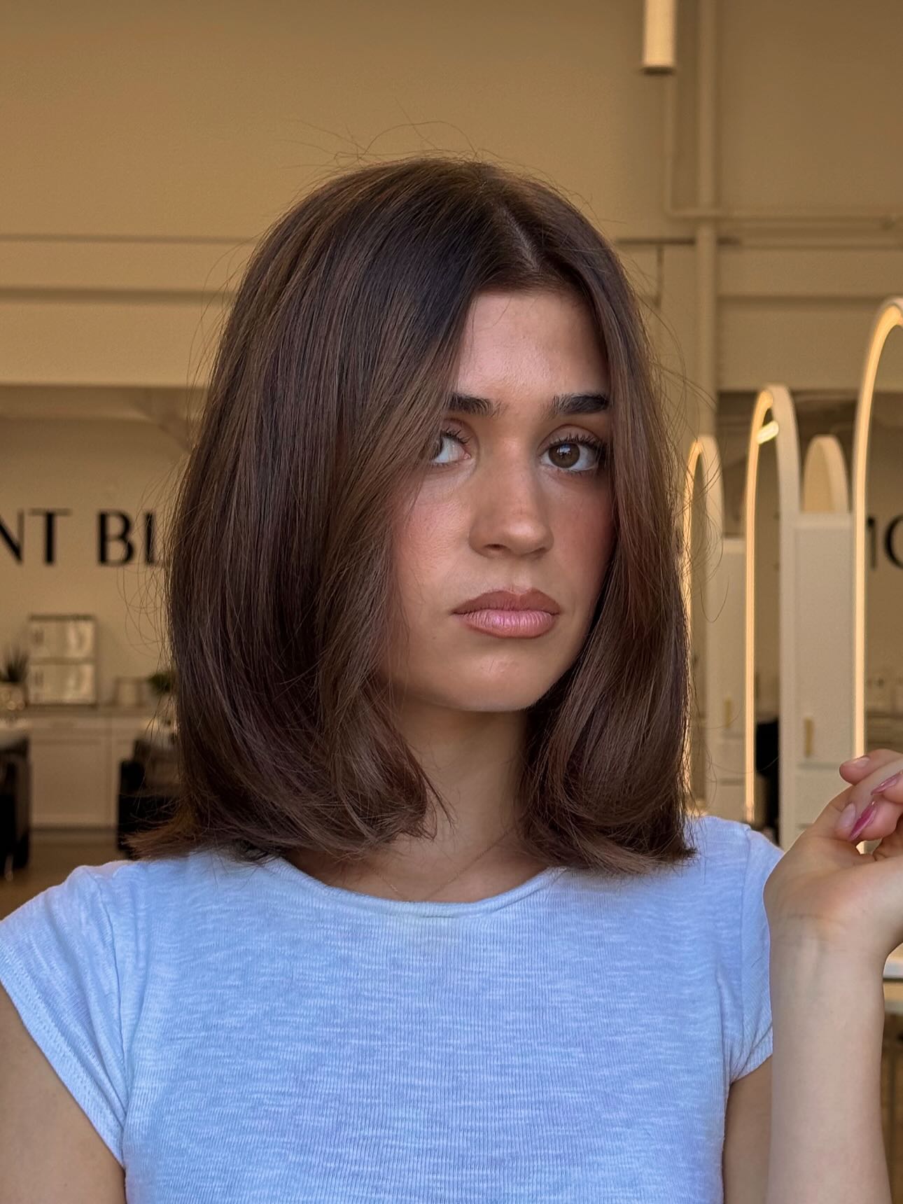 Voluminous brunette bob with curtain layers